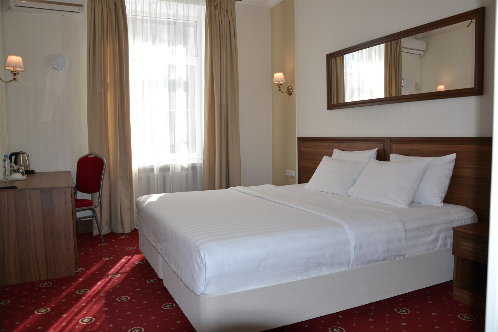 Улучшенный номер с кроватью размера «king-size» или 2 отдельными кроватями