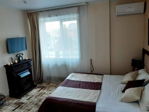 Трехместный номер Делюкс