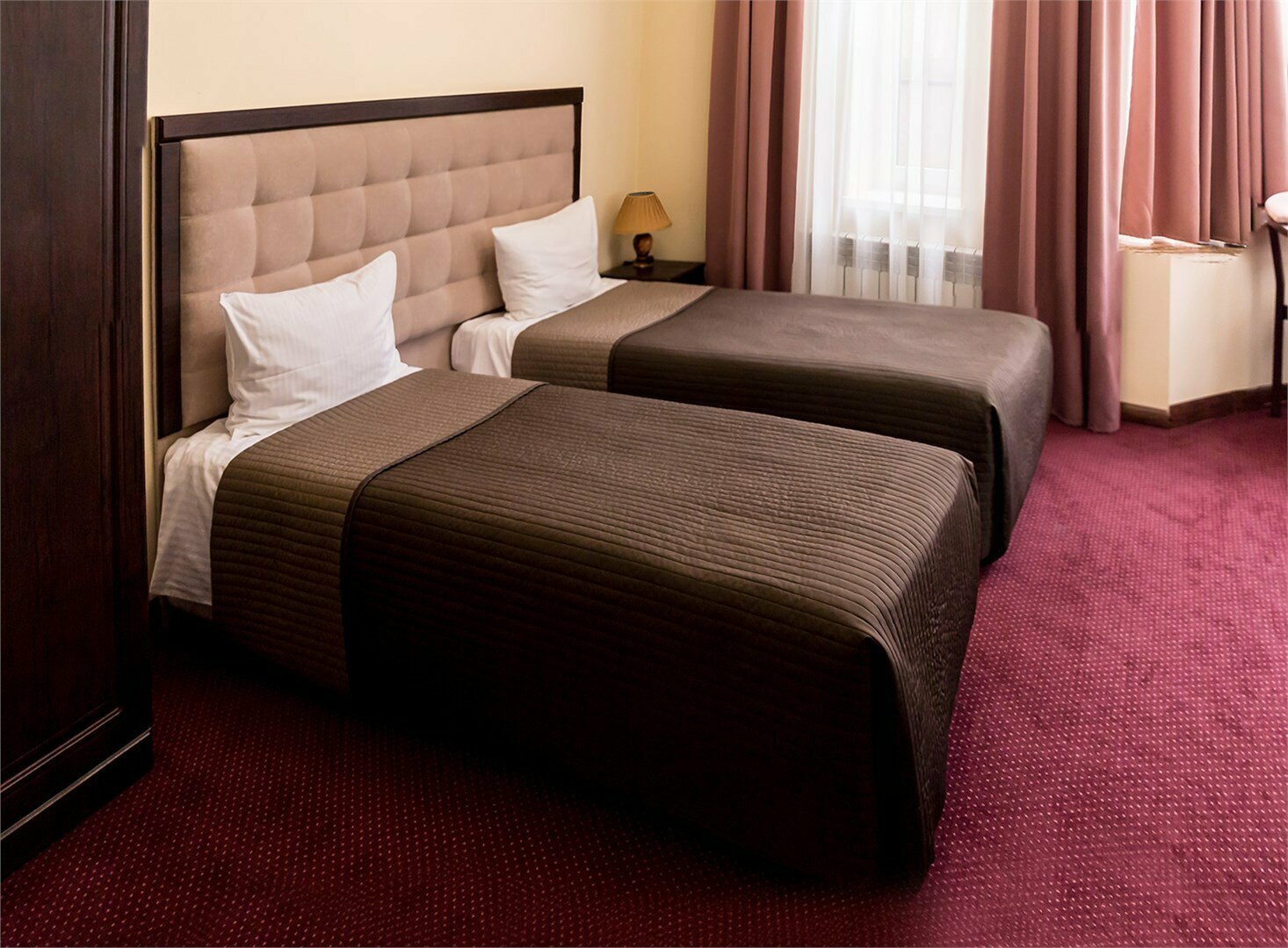 Улучшенный номер с одной  или двумя отдельными кроватями. Твин.