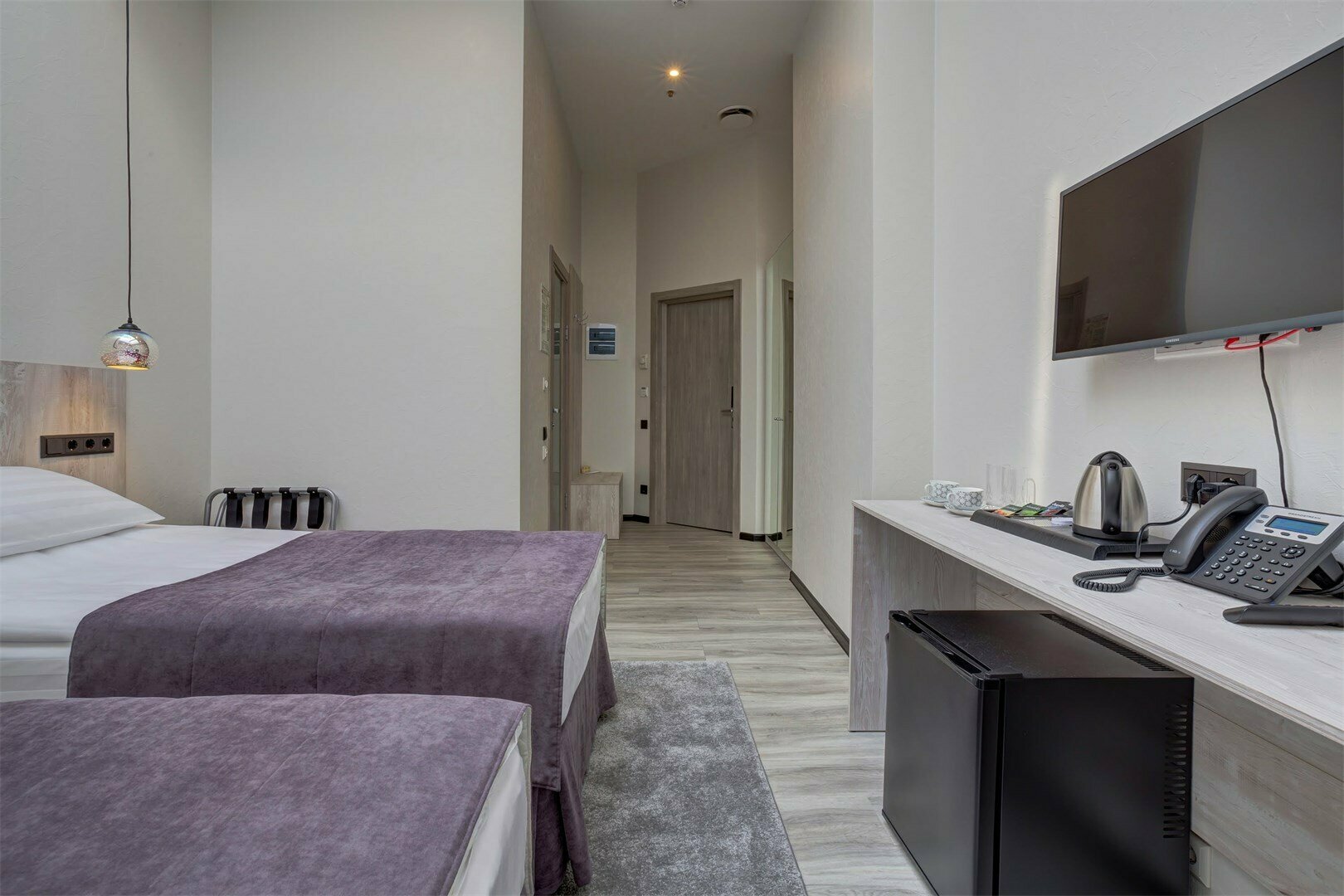 Стандартный двухместный номер с двумя раздельными или одной двуспальной кроватями с мансардными окнами