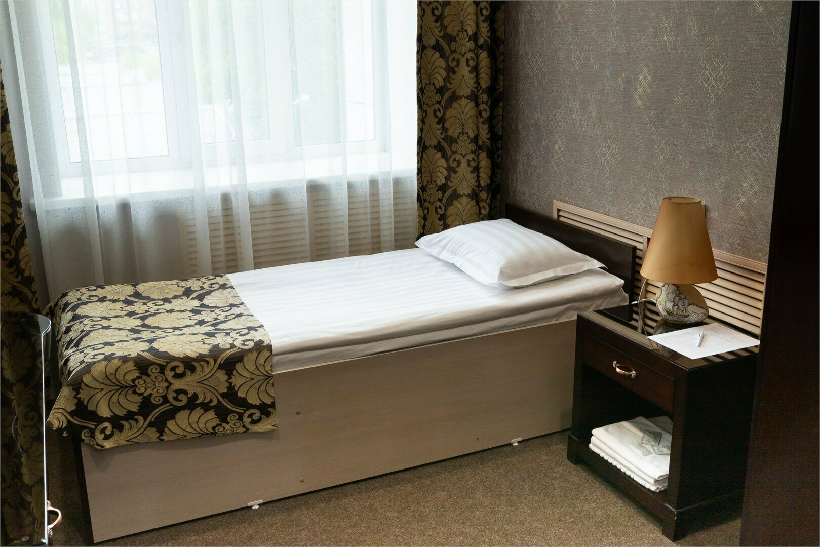 Одноместный номер с общей ванной комнатой