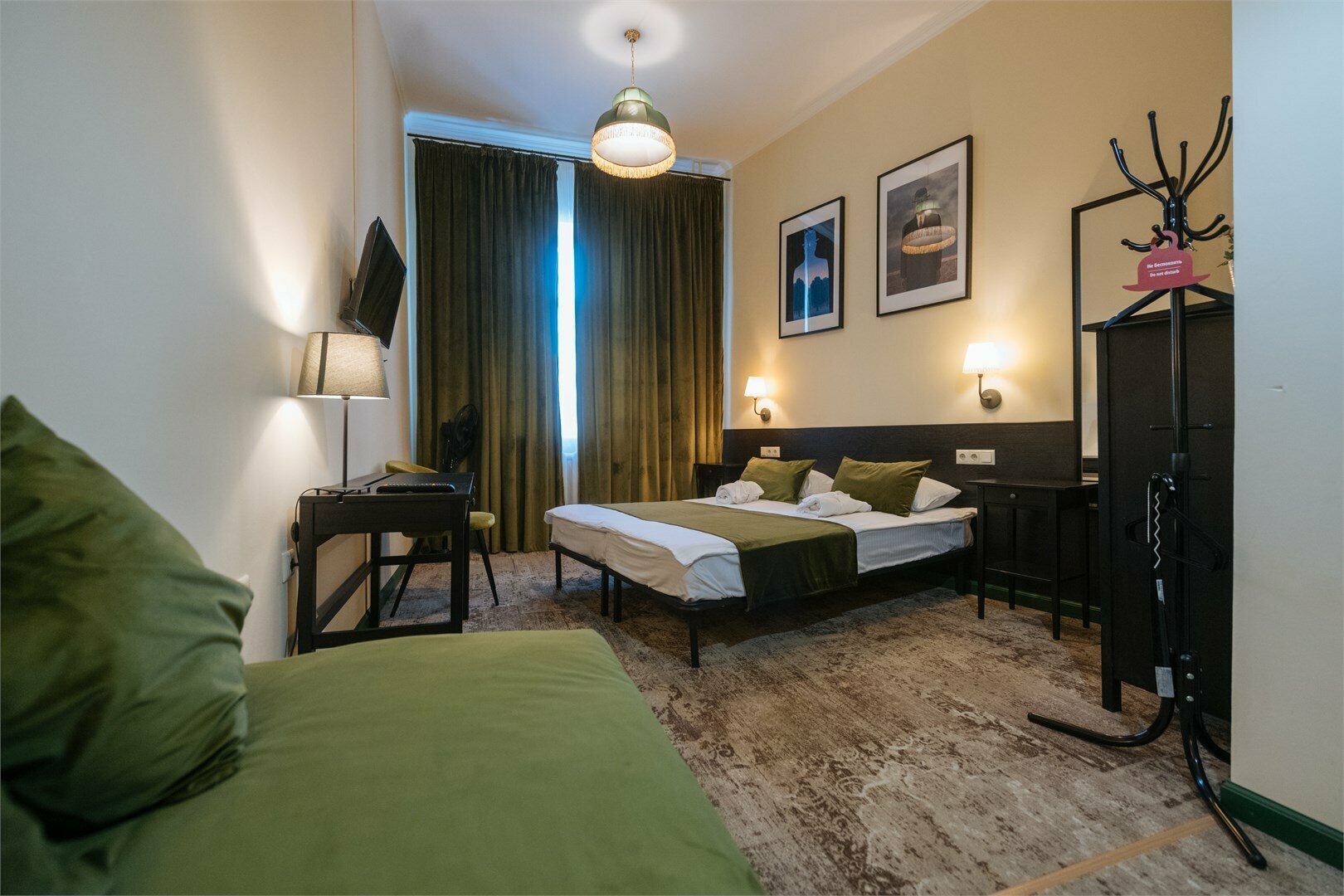 Номер Делюкс с 1 кроватью или 2 отдельными кроватями и дополнительной кроватью