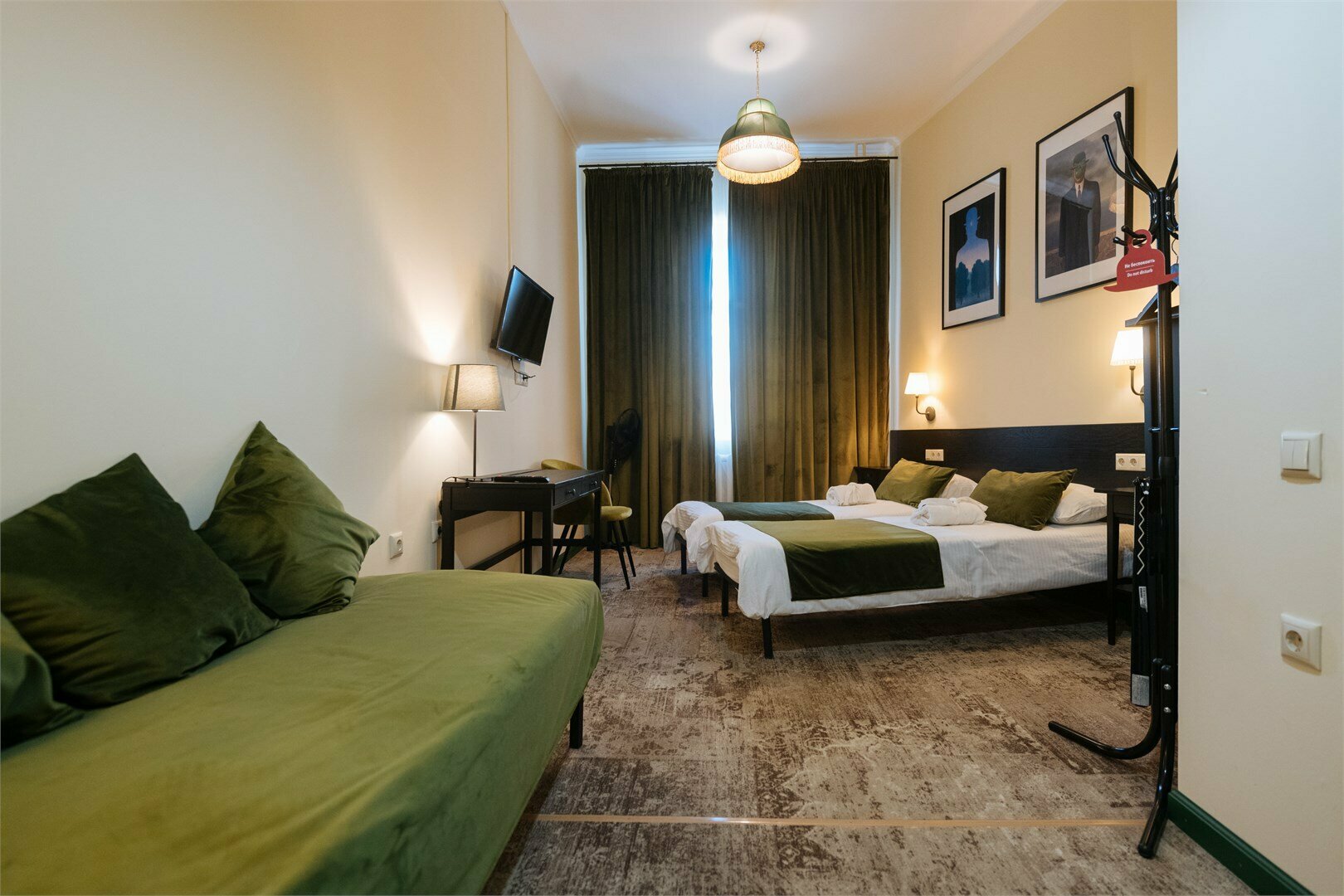 Номер Делюкс с 1 кроватью или 2 отдельными кроватями и дополнительной кроватью