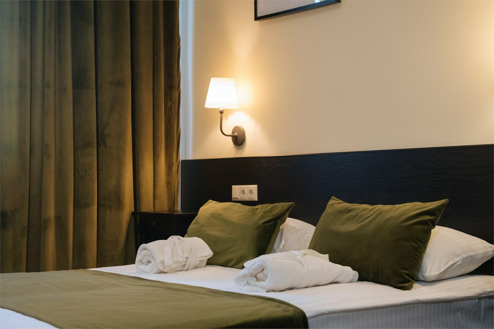 Номер Делюкс с 1 кроватью или 2 отдельными кроватями и дополнительной кроватью