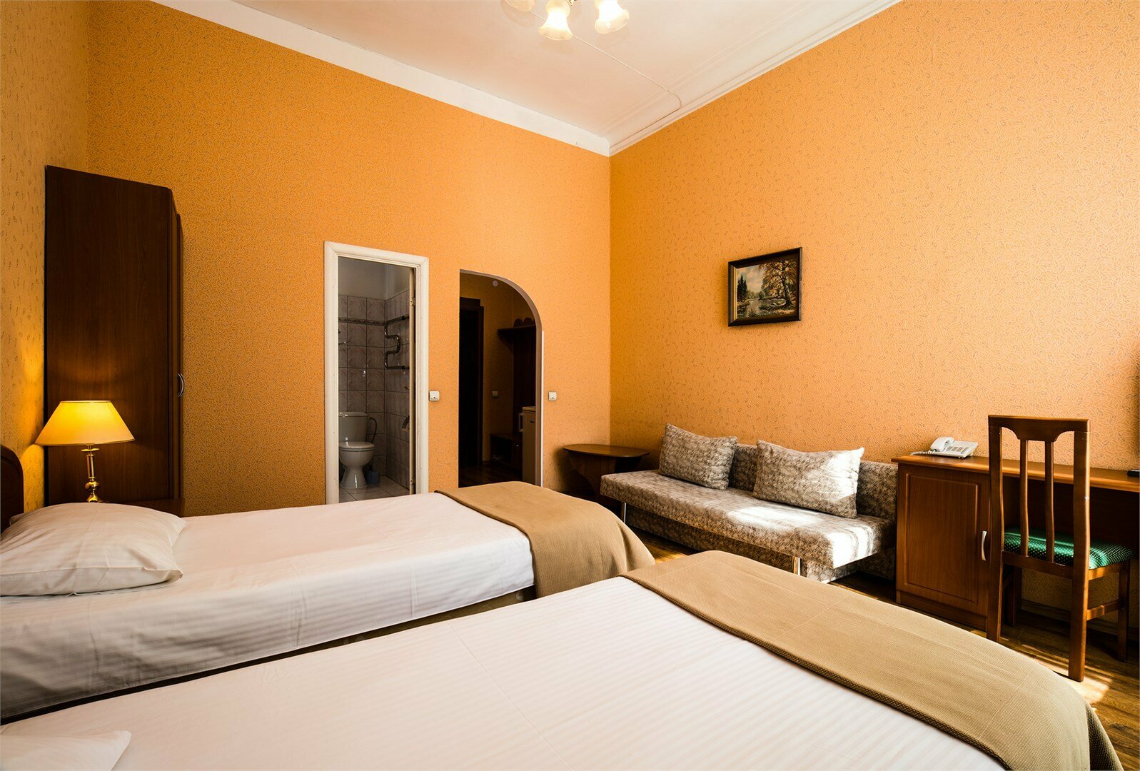 Стандарт двухместный с двумя раздельными  кроватями и дополнительным местом