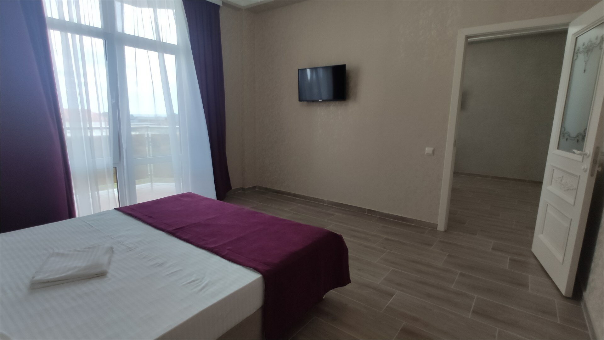 Четырехместный номер Делюкс