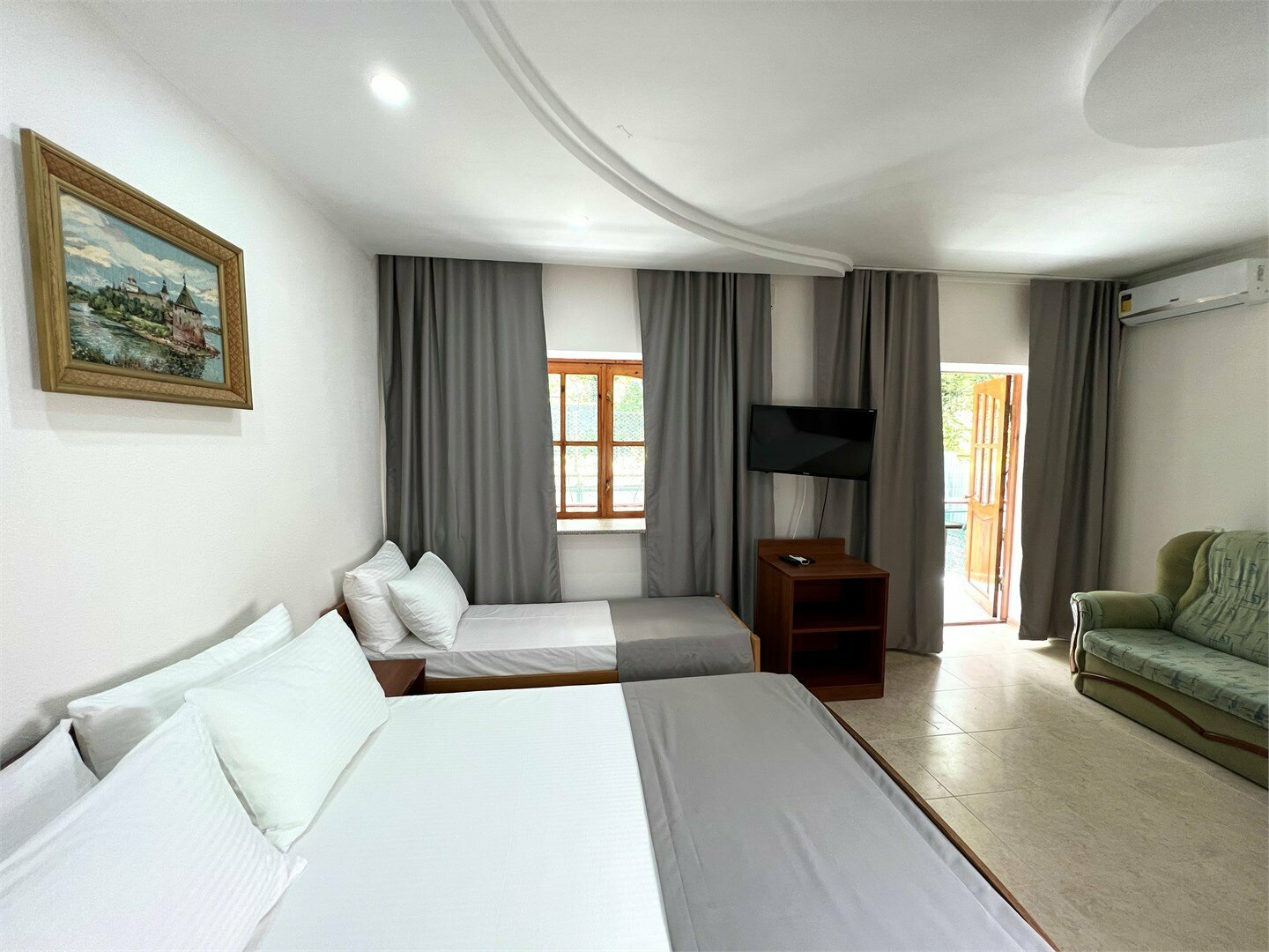 Трехместный номер Deluxe