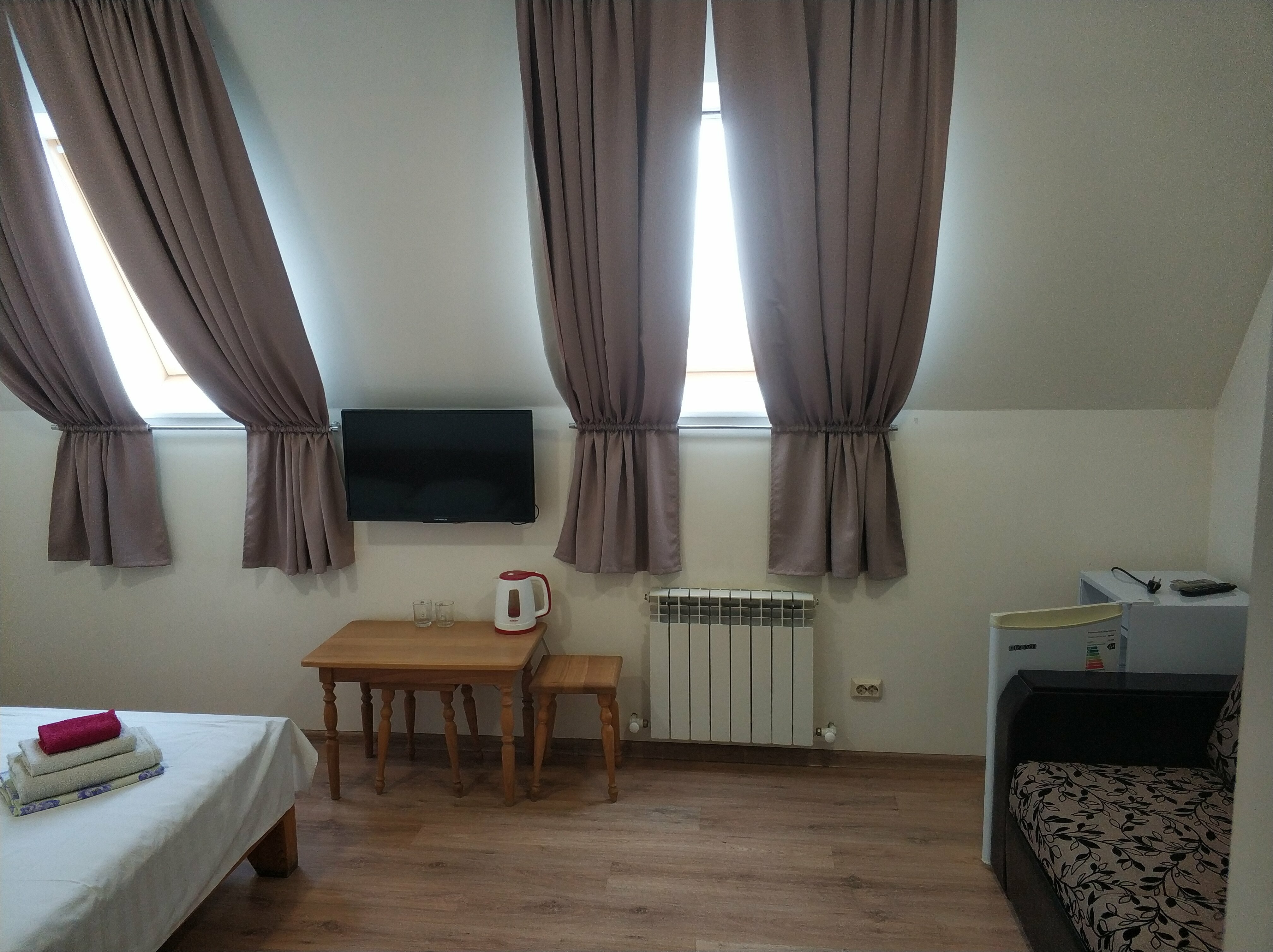 Улучшенный четырехместный номер