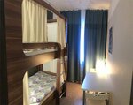 Спальное место на двухъярусной кровати в общем номере для мужчин в Золотое кольцо