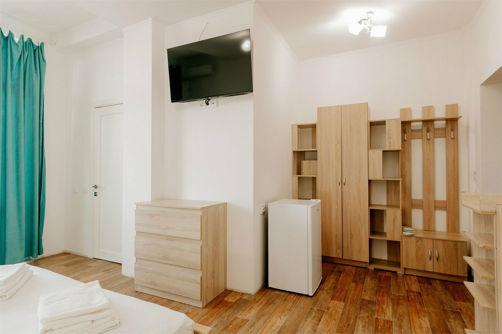 Трехместный номер с балконом