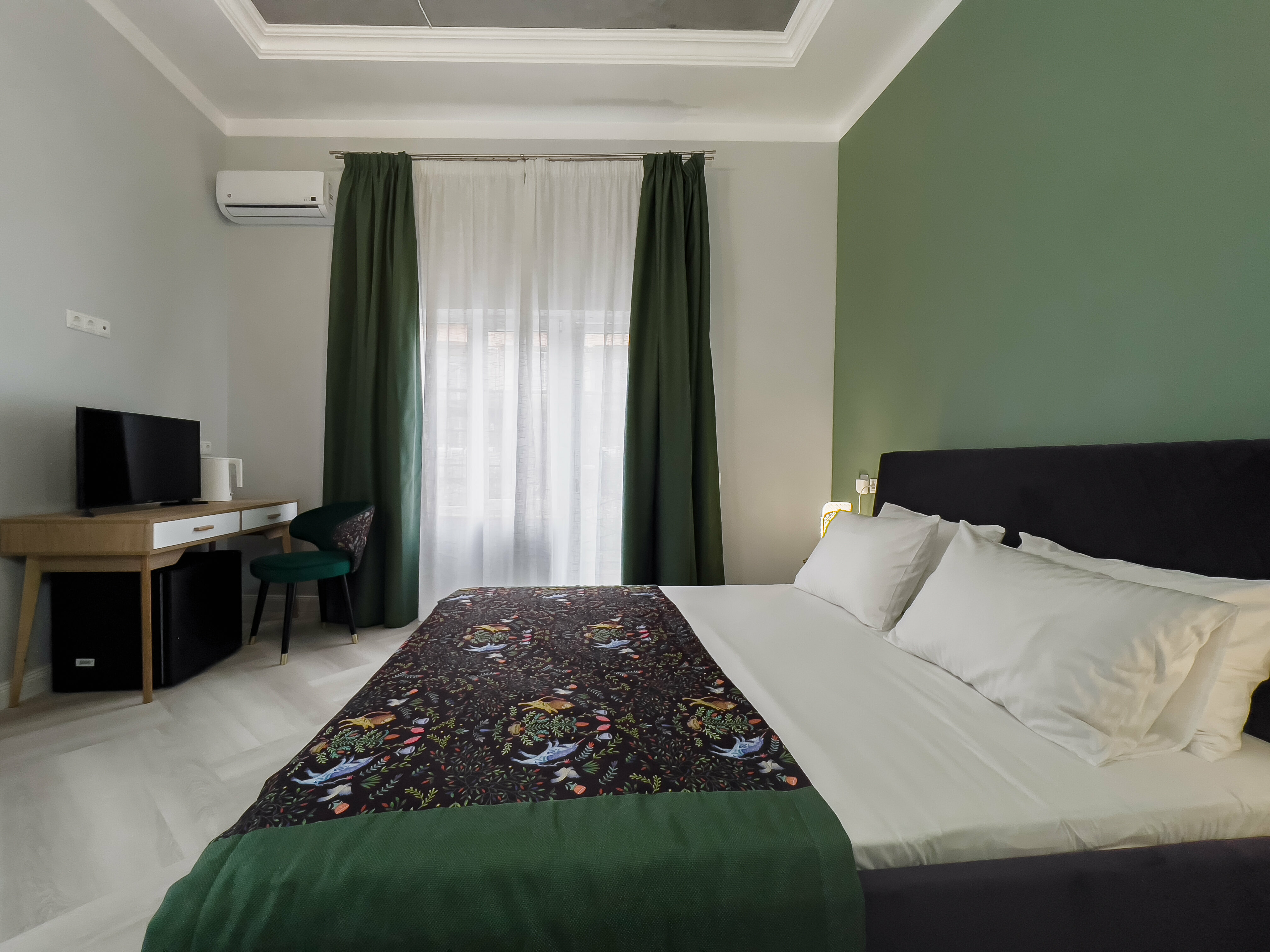 Четырехместный номер Делюкс