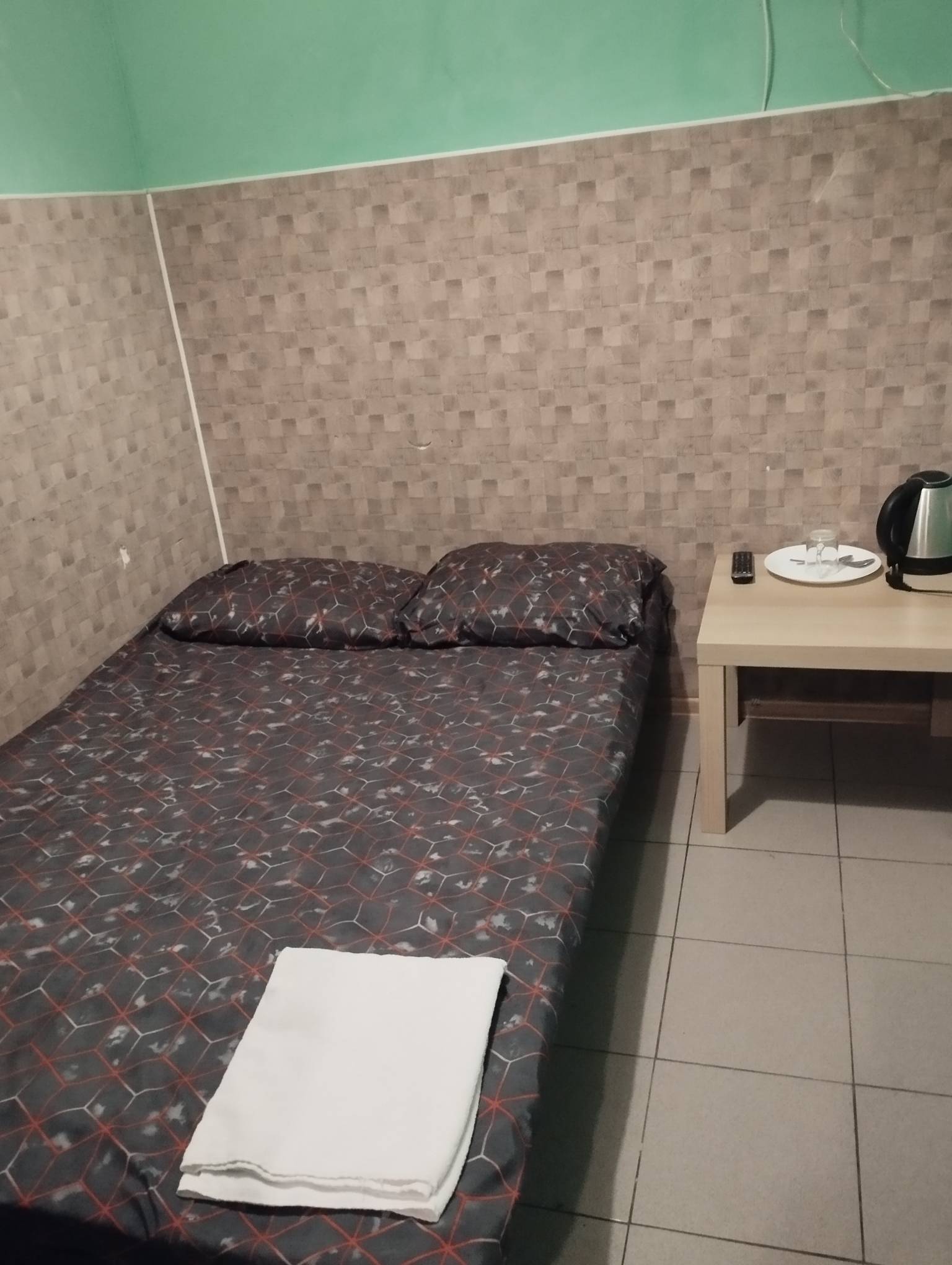 Одноместный номер с общим душем и туалетом