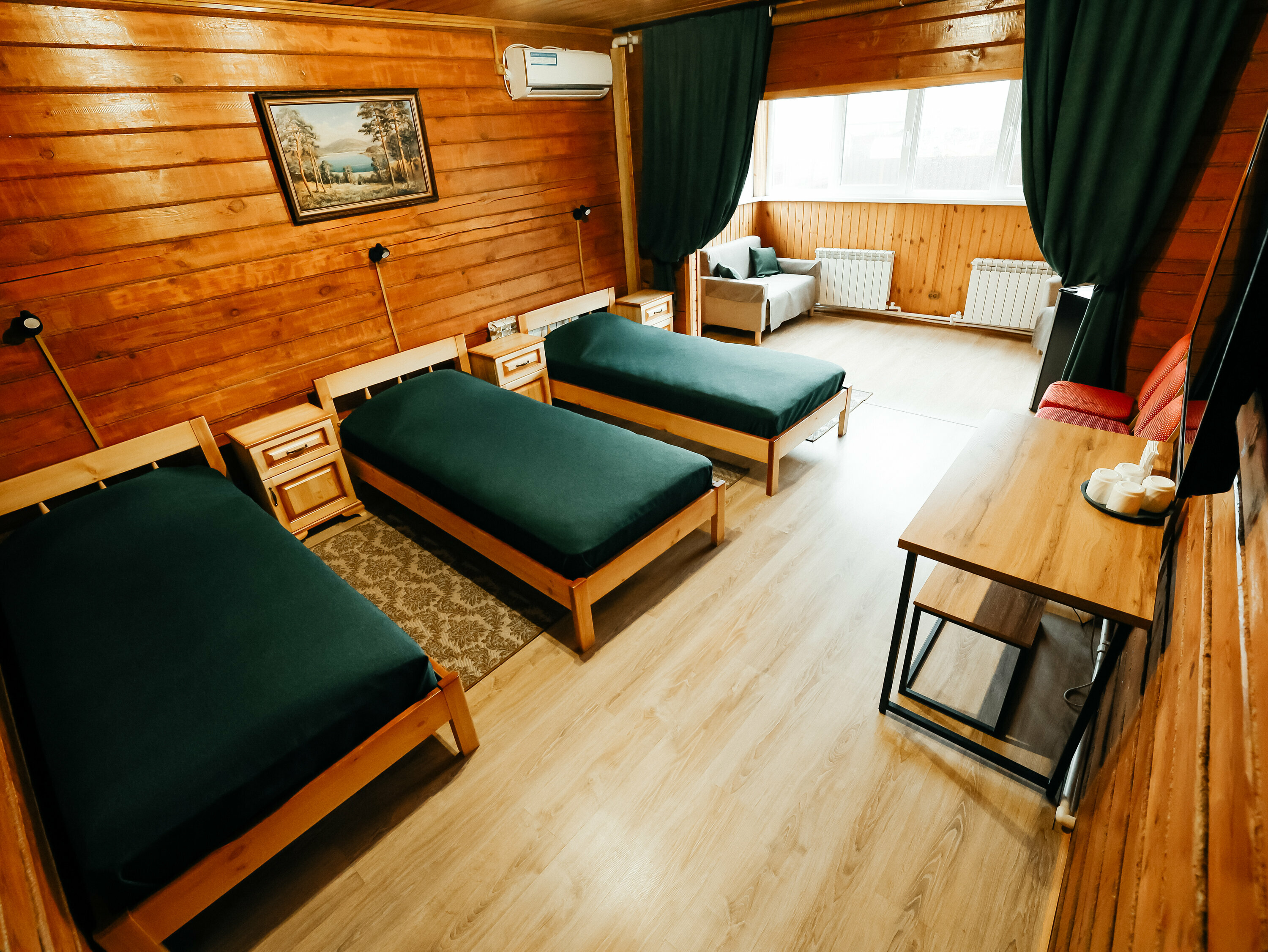 Трехместный номер Делюкс