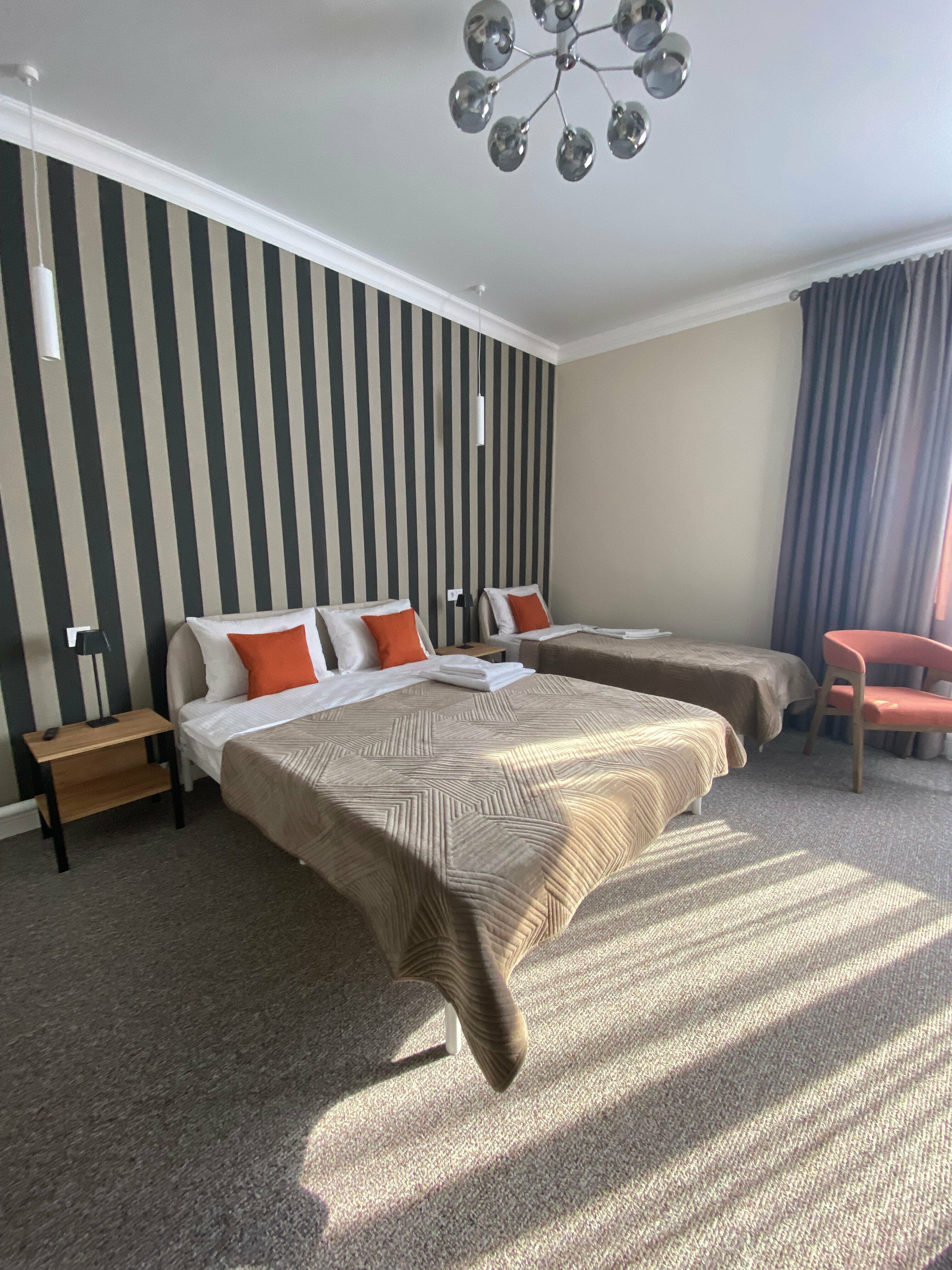 Улучшенный трехместный номер