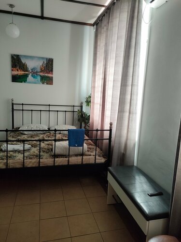 Четырехместный номер с общей ванной комнатой в Мотель Еврозона