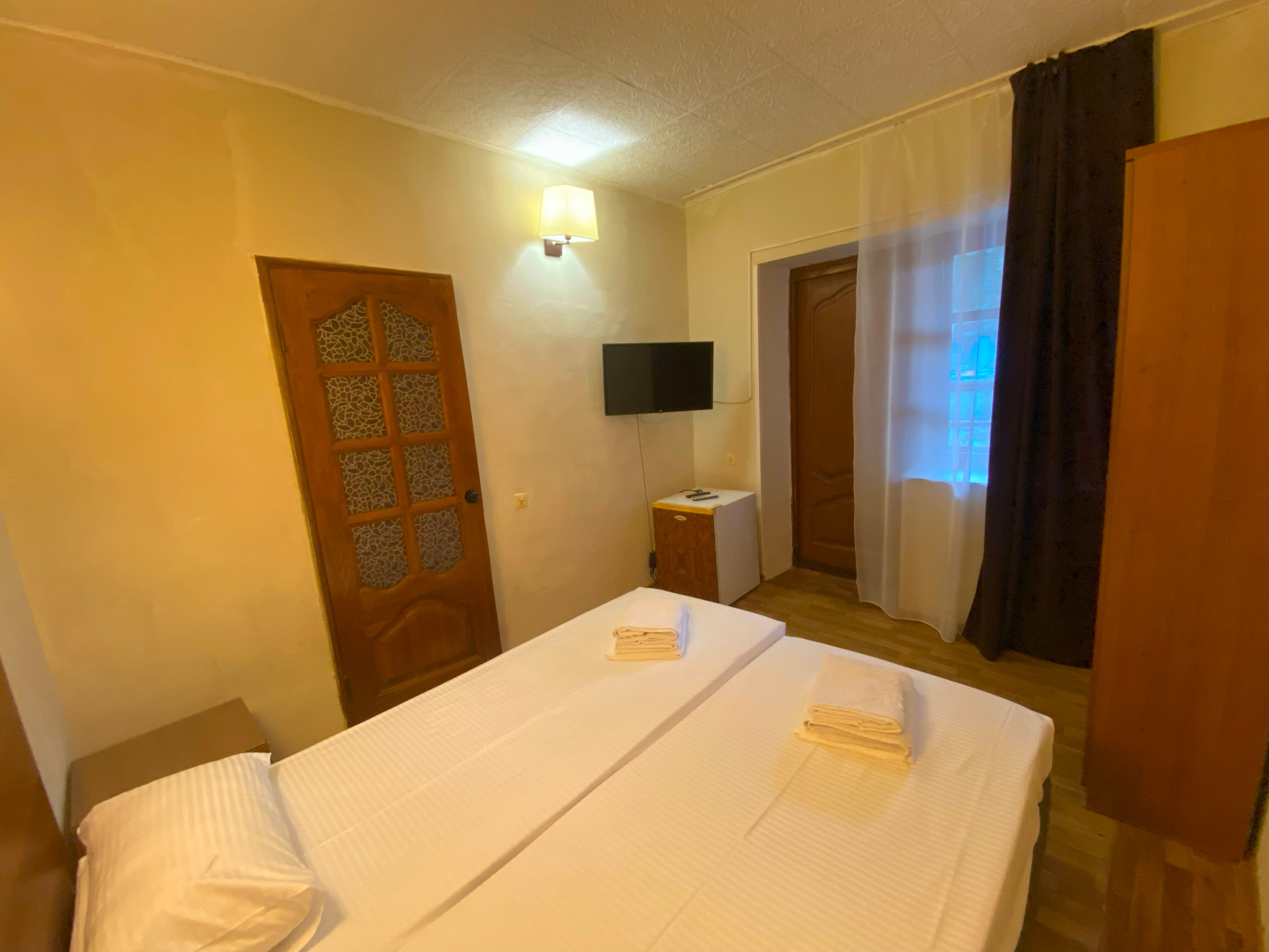 Двухместный номер с 2 отдельными кроватями и балконом