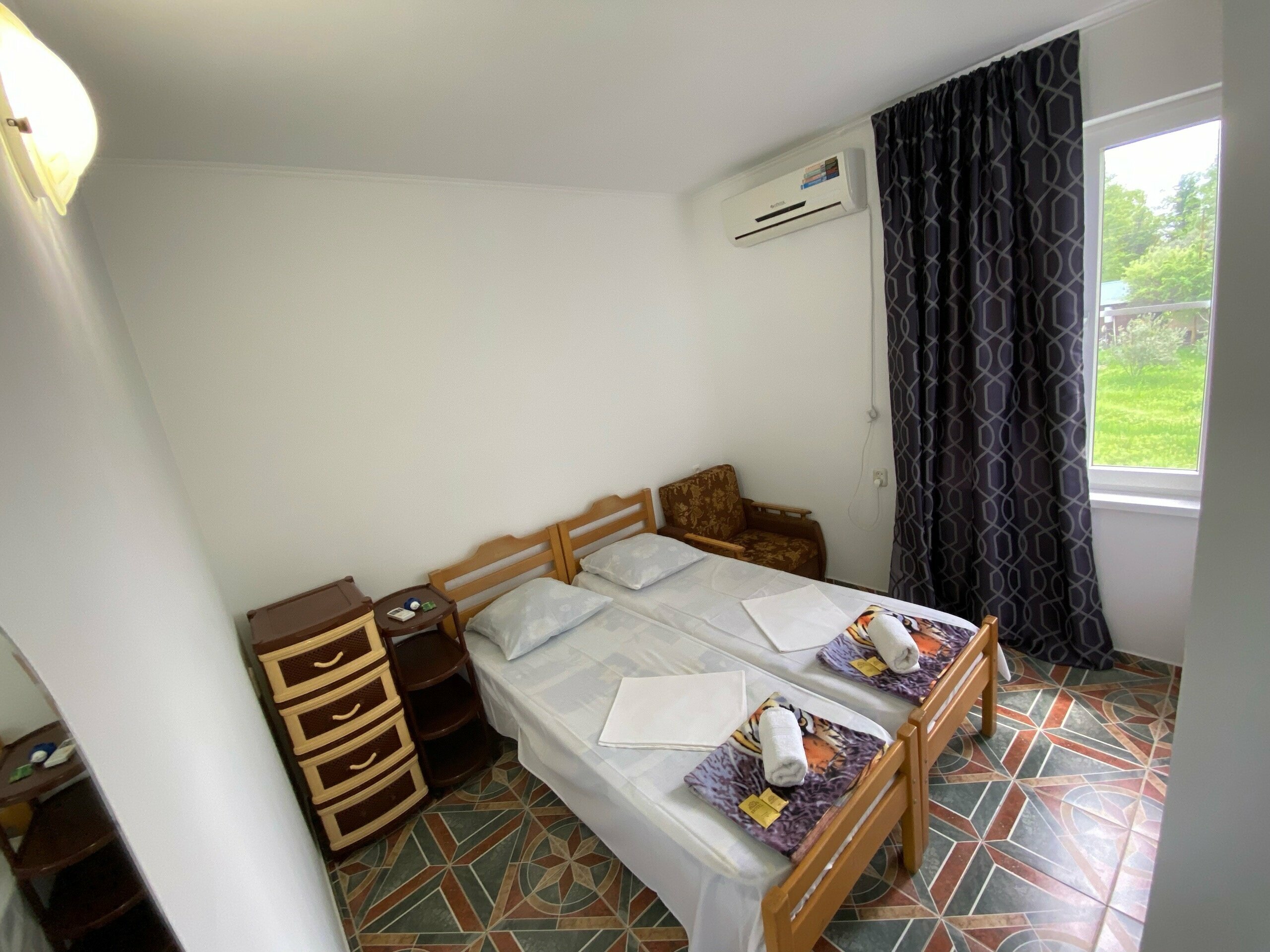 Двухместный номер с 2 отдельными кроватями и душем