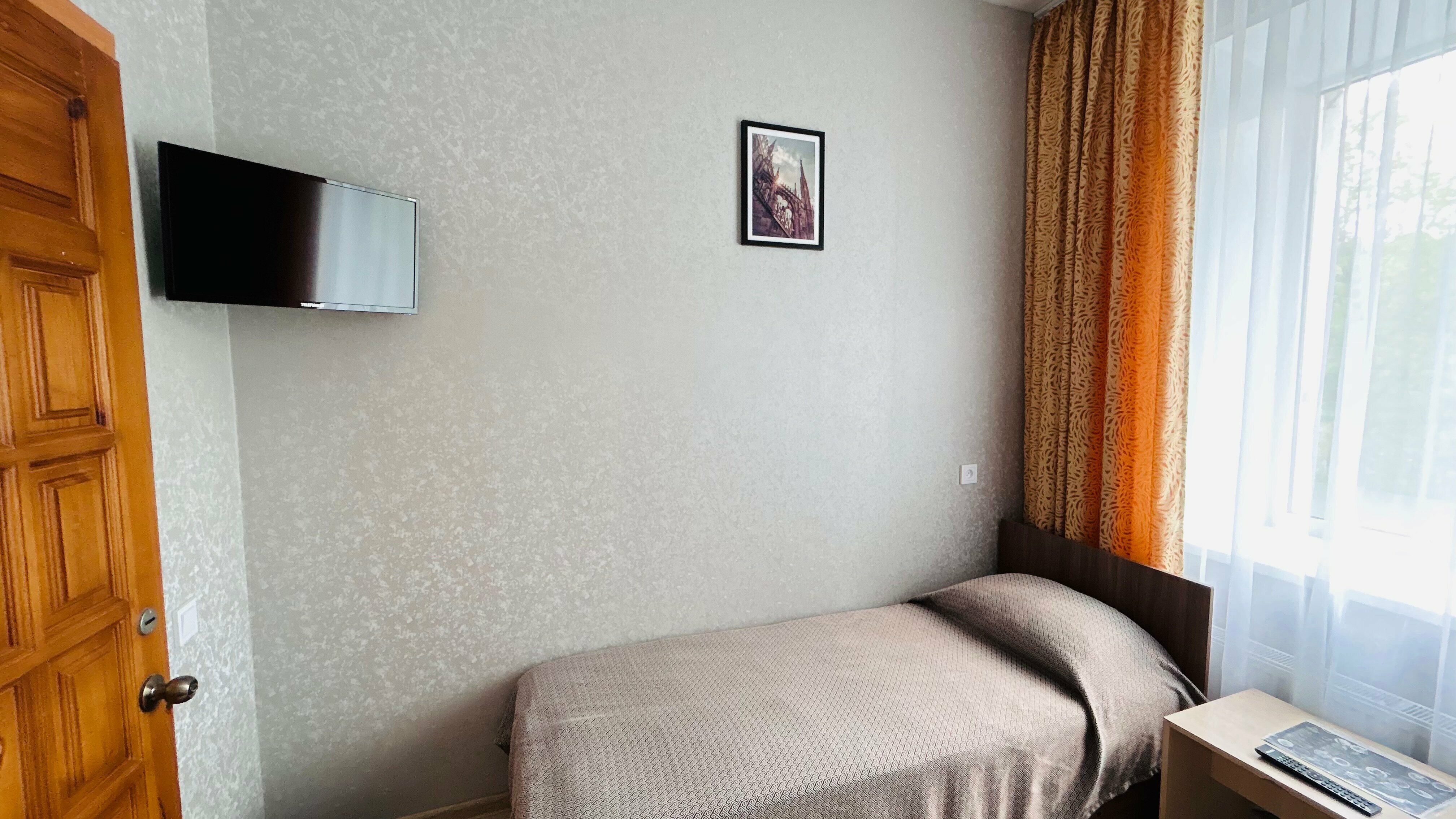 Одноместный номер с общим душем и туалетом