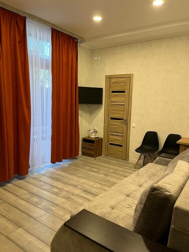 Номер-студия с видом на сад в Sunny Smile inn