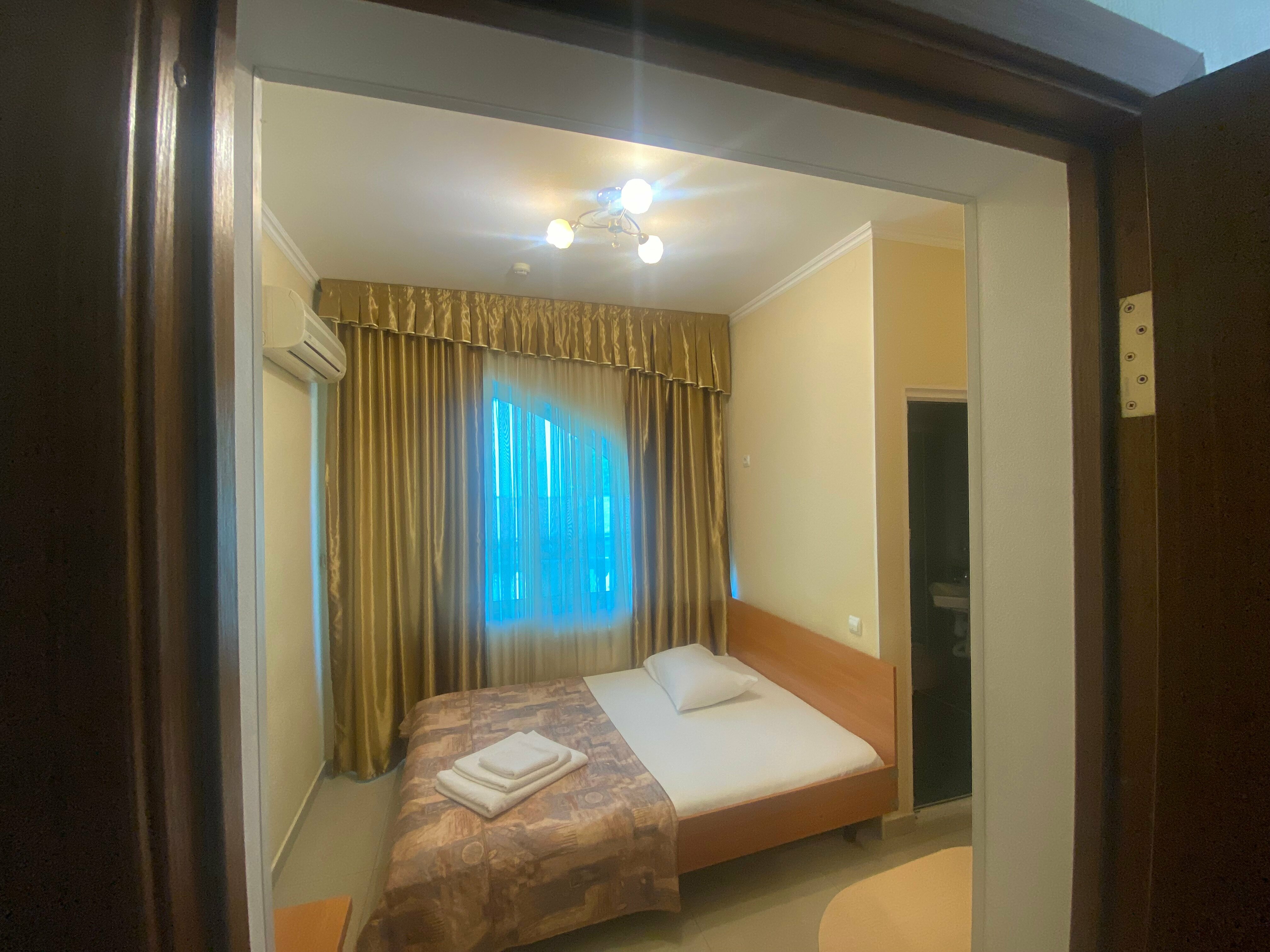 Двухместный номер эконом-класса с 1 кроватью или 2 отдельными кроватями