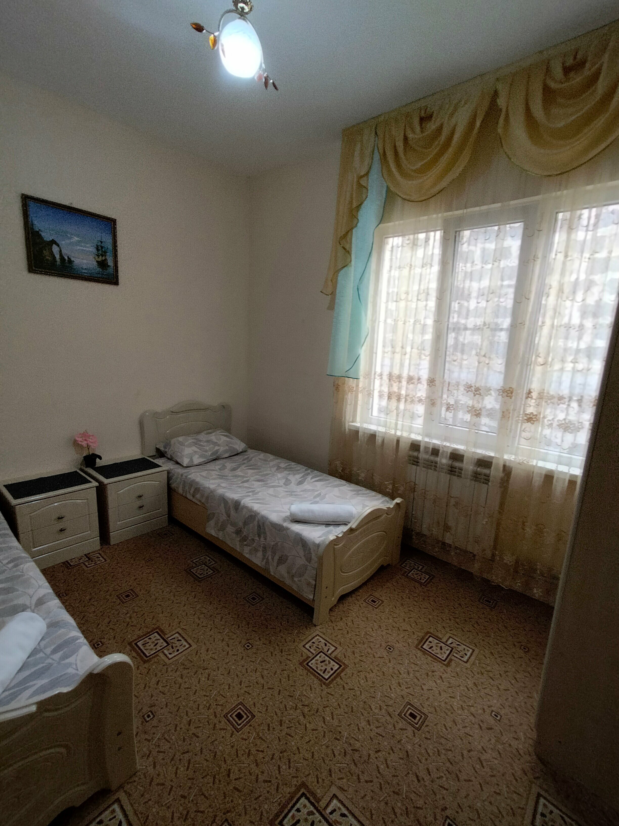 Двухместный номер с 2 отдельными кроватями и ванной