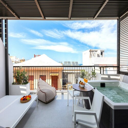 Junior Suite Sea View with Outdoor Jetted Tub в Porta Suites
