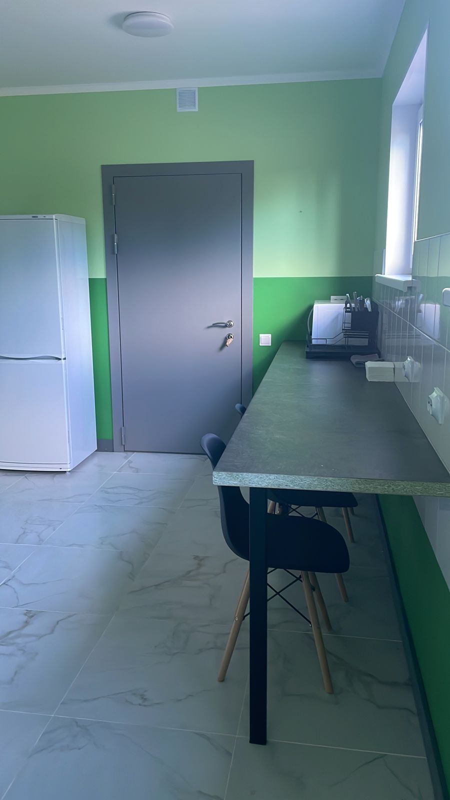 Трехместный номер с общей ванной комнатой