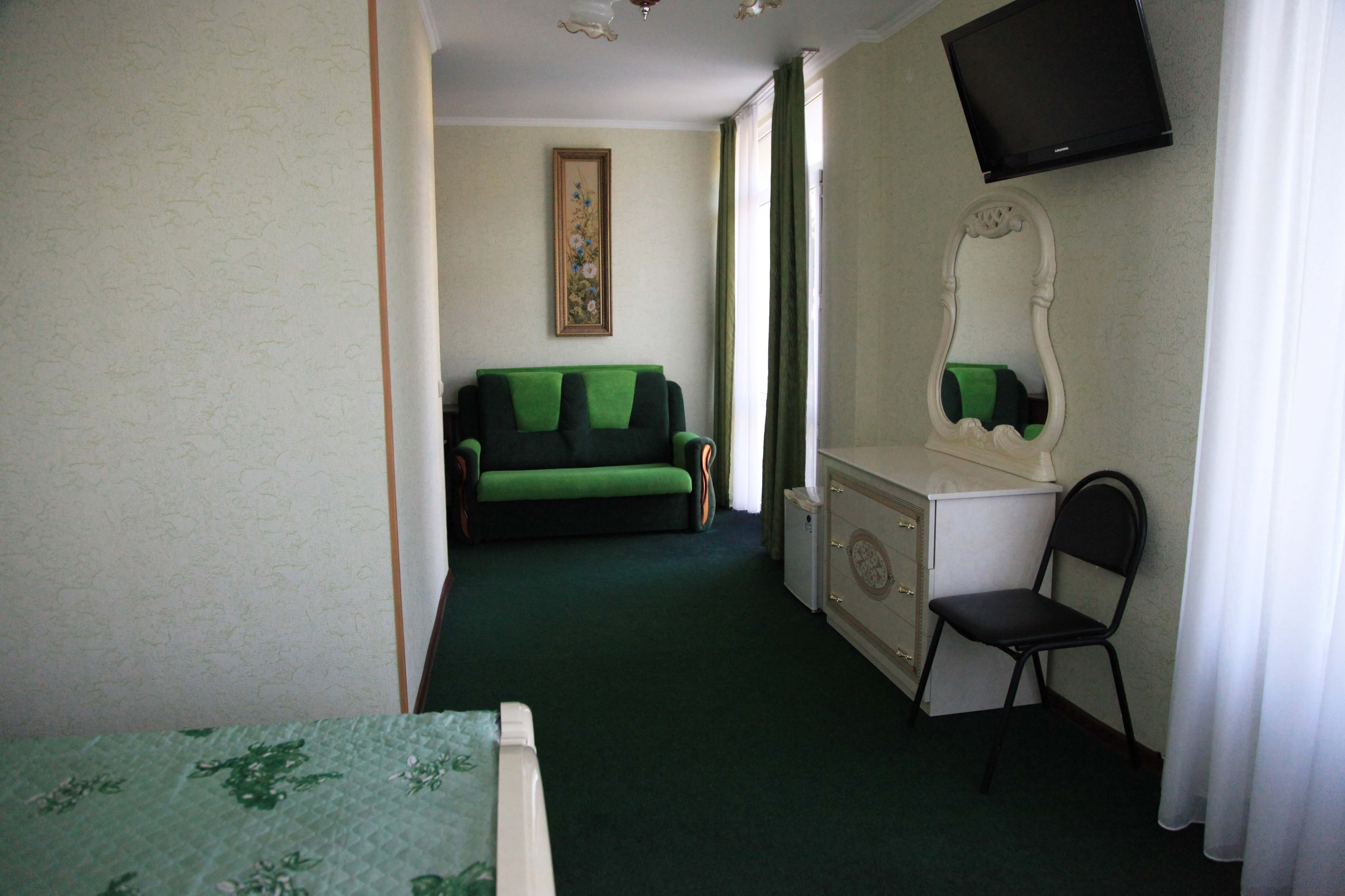 Четырехместный номер с балконом