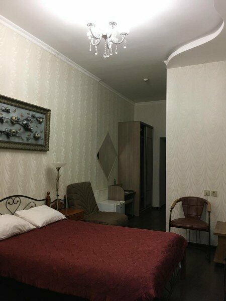 Трехместный номер Делюкс