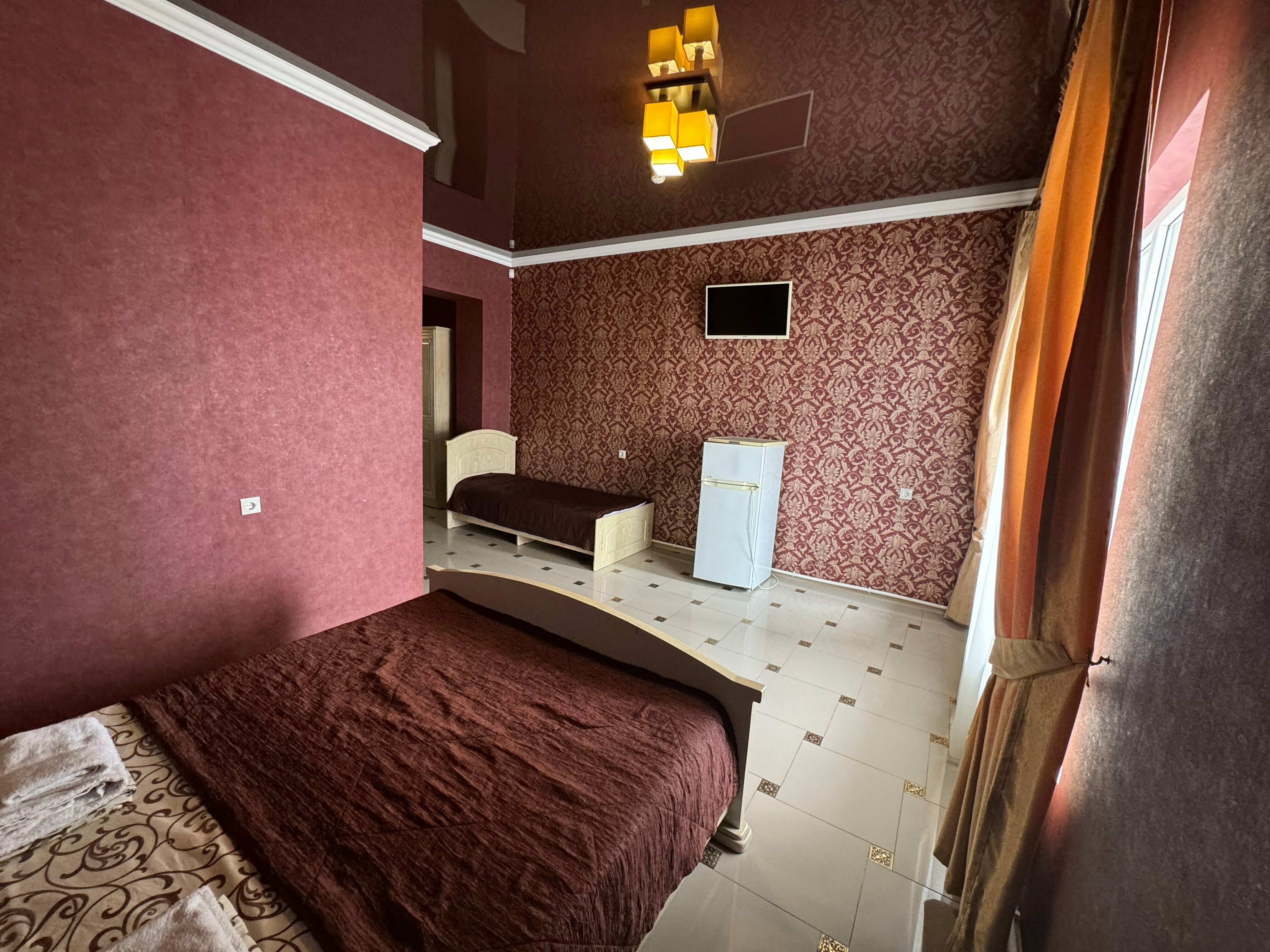 Трехместный номер Делюкс