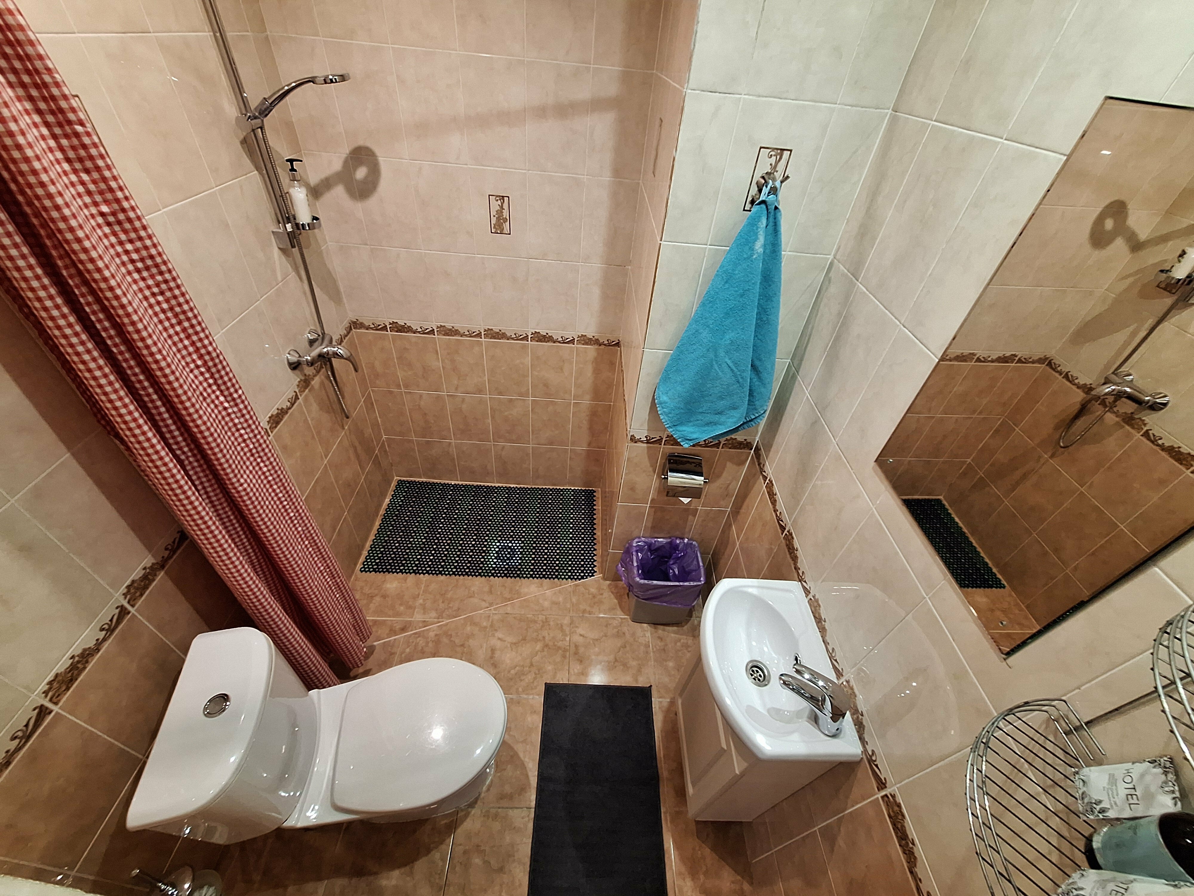 Двухместный номер с 2 отдельными кроватями и душем