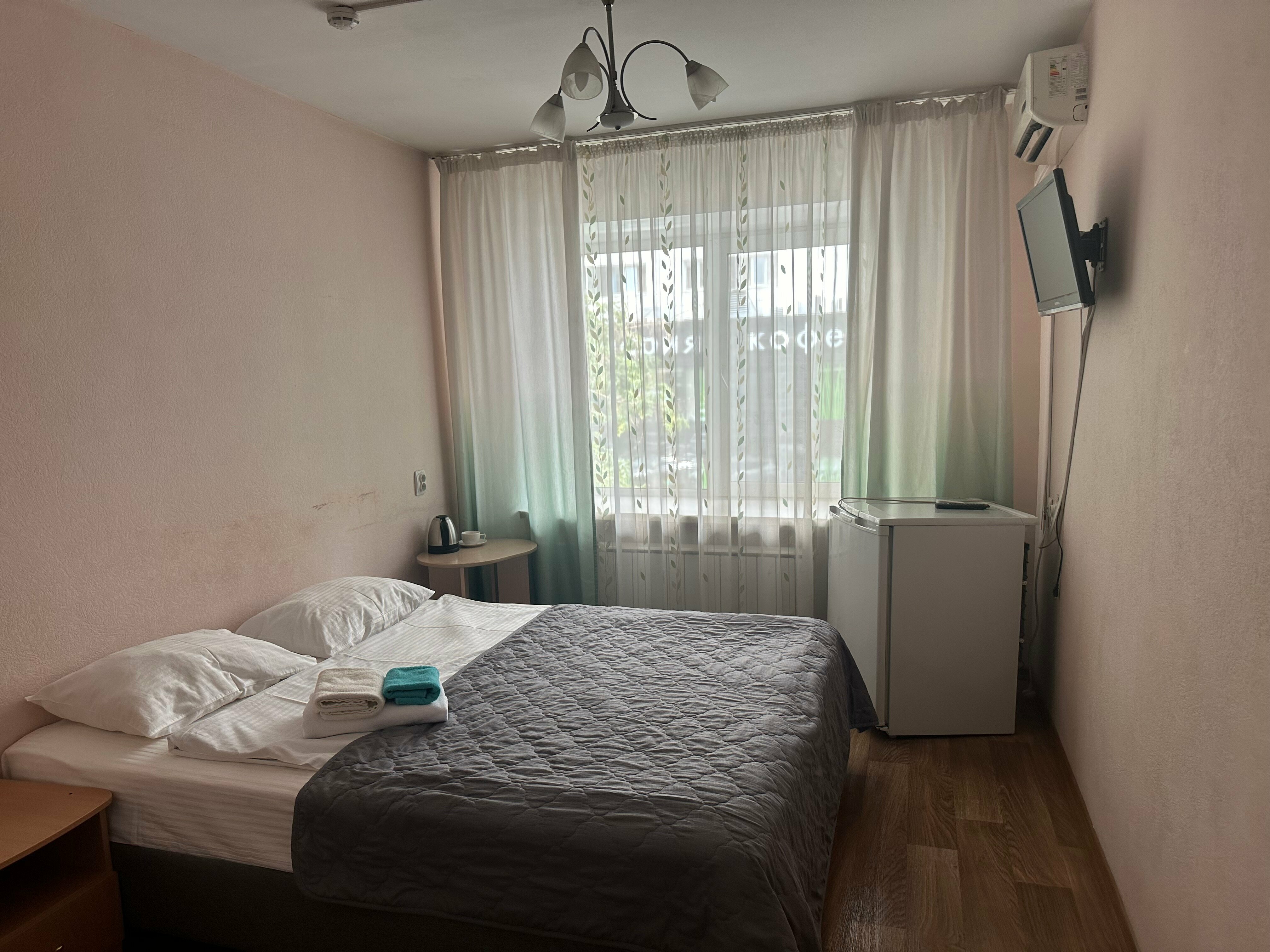 Одно-двухместный номер Стандарт Улучшенный Двухспальная кровать Улучшенный