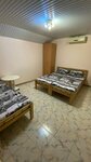 Трехместный номер эконом-класса с общей ванной комнатой в Лилия