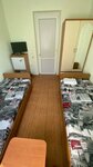 Двухместный номер с 2 отдельными кроватями и общим туалетом в Лилия