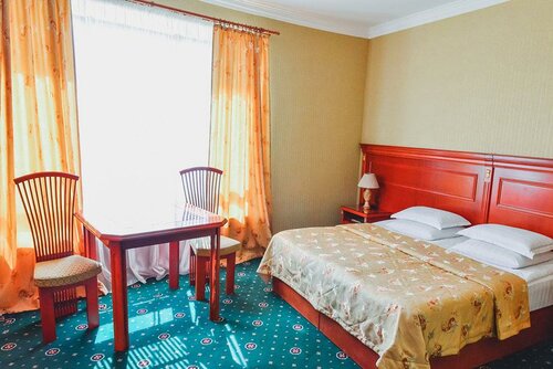 Номер стандарт с 1 двуспальной кроватью в Атис