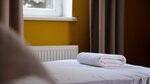 Номер стандарт с 2 односпальными кроватями в People Hostel & Suites