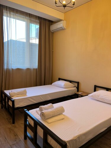 Номер стандарт с 2 односпальными кроватями в Loft