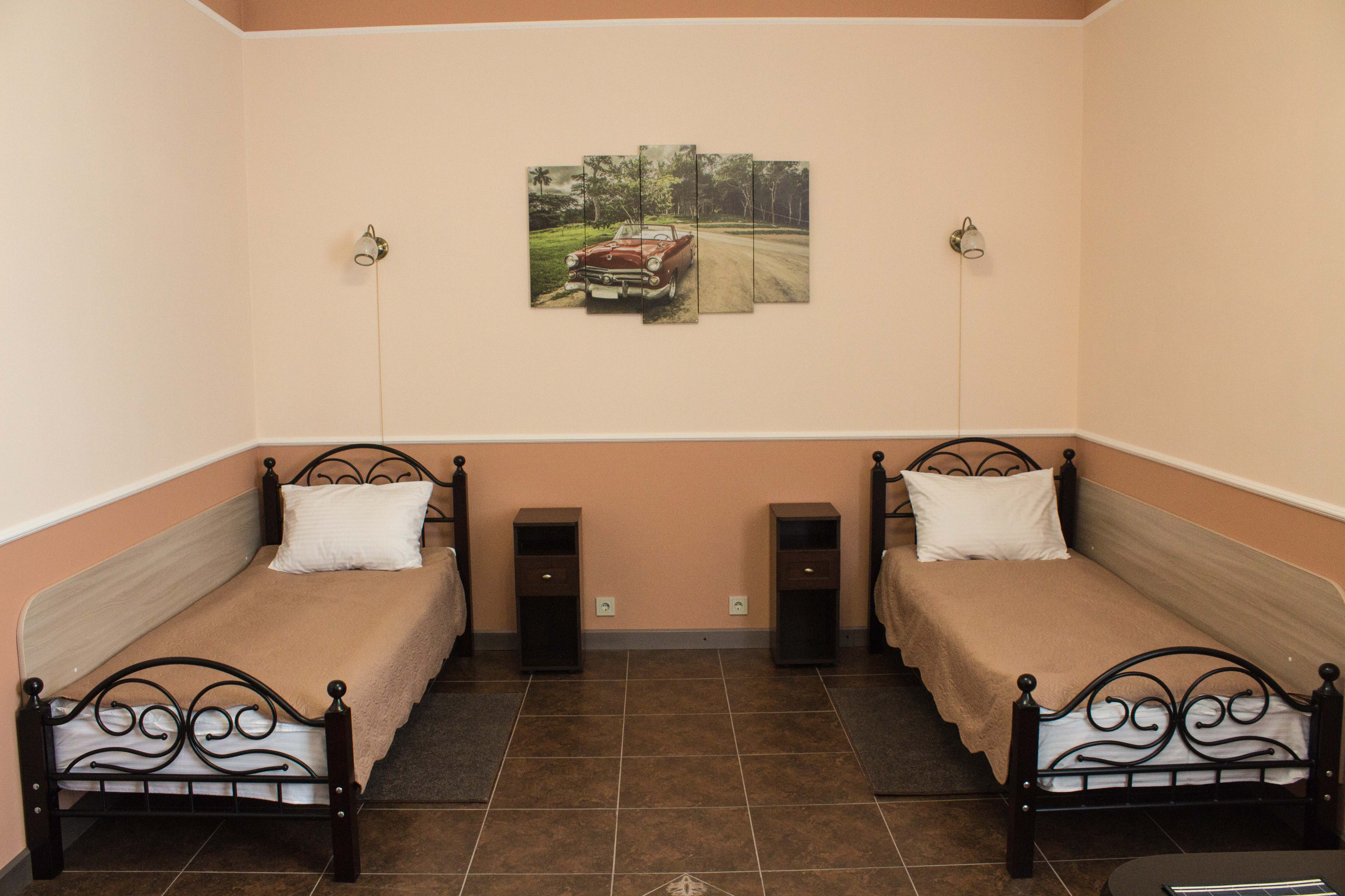 Стандартный номер с 2 односпальными кроватями и диваном