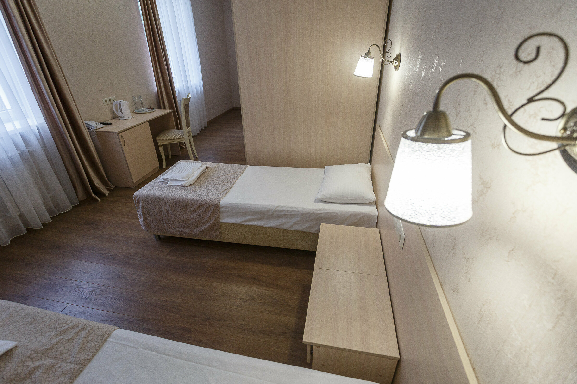 Двухместный номер с 2 отдельными кроватями и душем