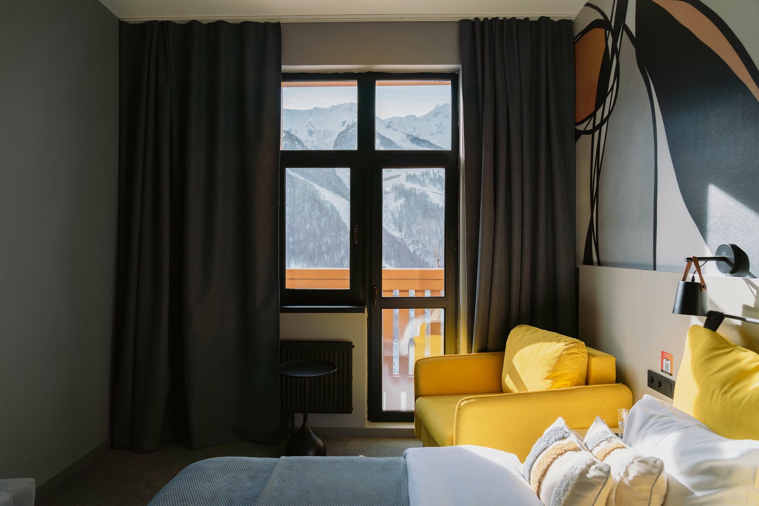 Делюкс с балконом и видом на горы