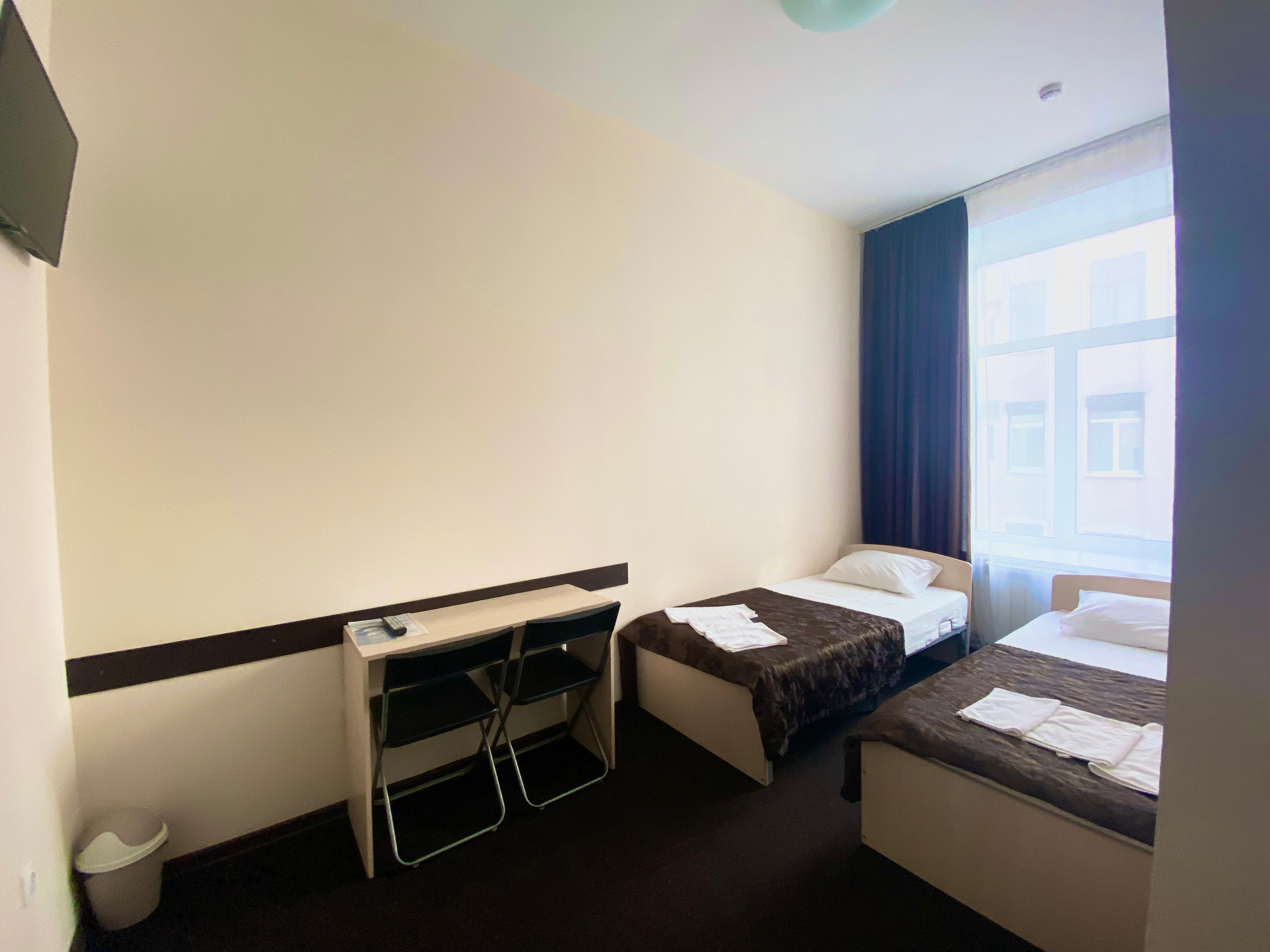 Двухместный номер эконом-класса с 1 кроватью или 2 отдельными кроватями