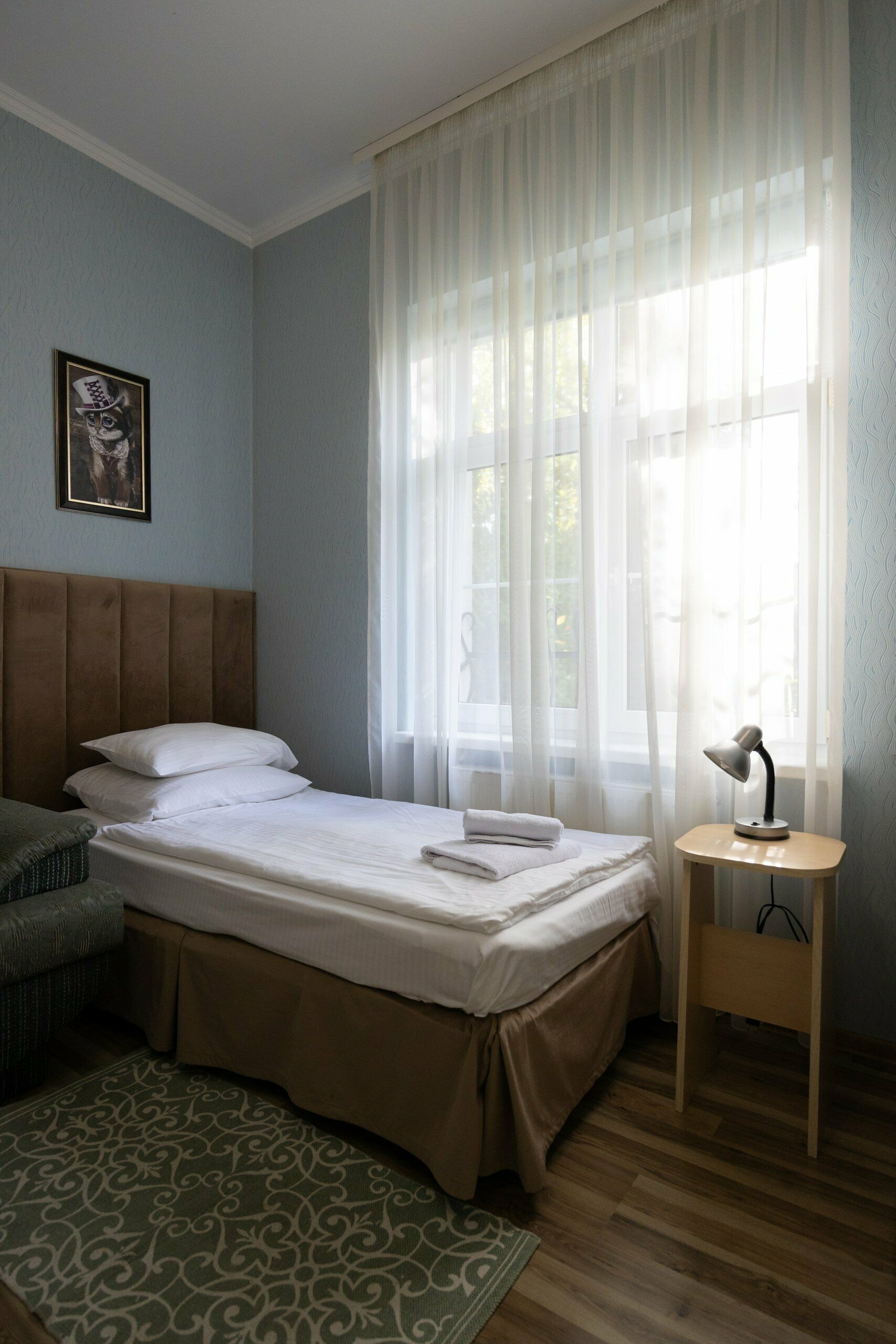 Улучшенное двухместное размещение +доп.место ( 2 отдельные кровати+диван)