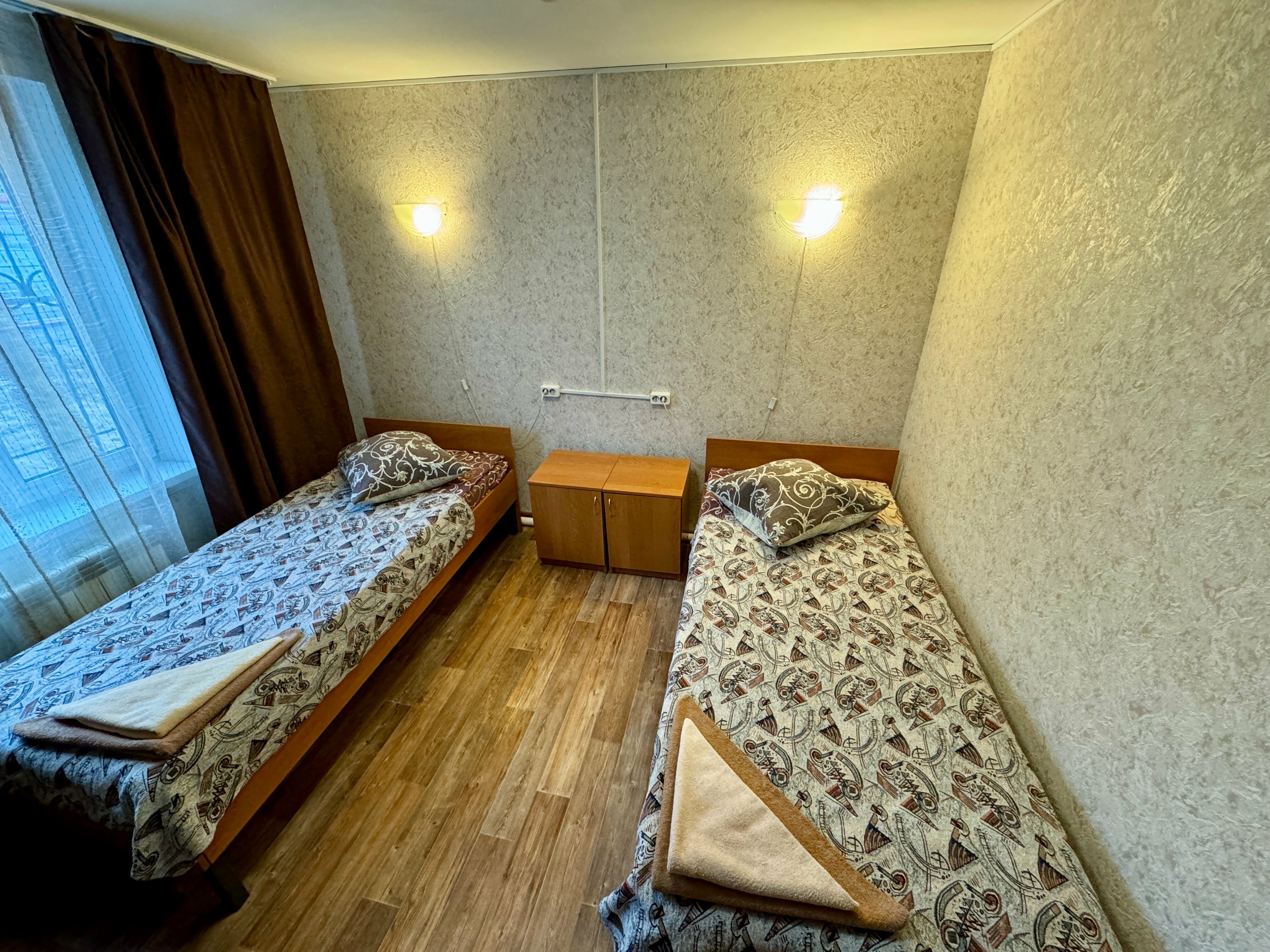 Двухместный номер с 2 отдельными кроватями и душем