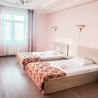 Просторный двухместный номер с 2 отдельными кроватями