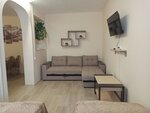 Четырехместный номер (2-односпальные кровати + диван) в Карелия