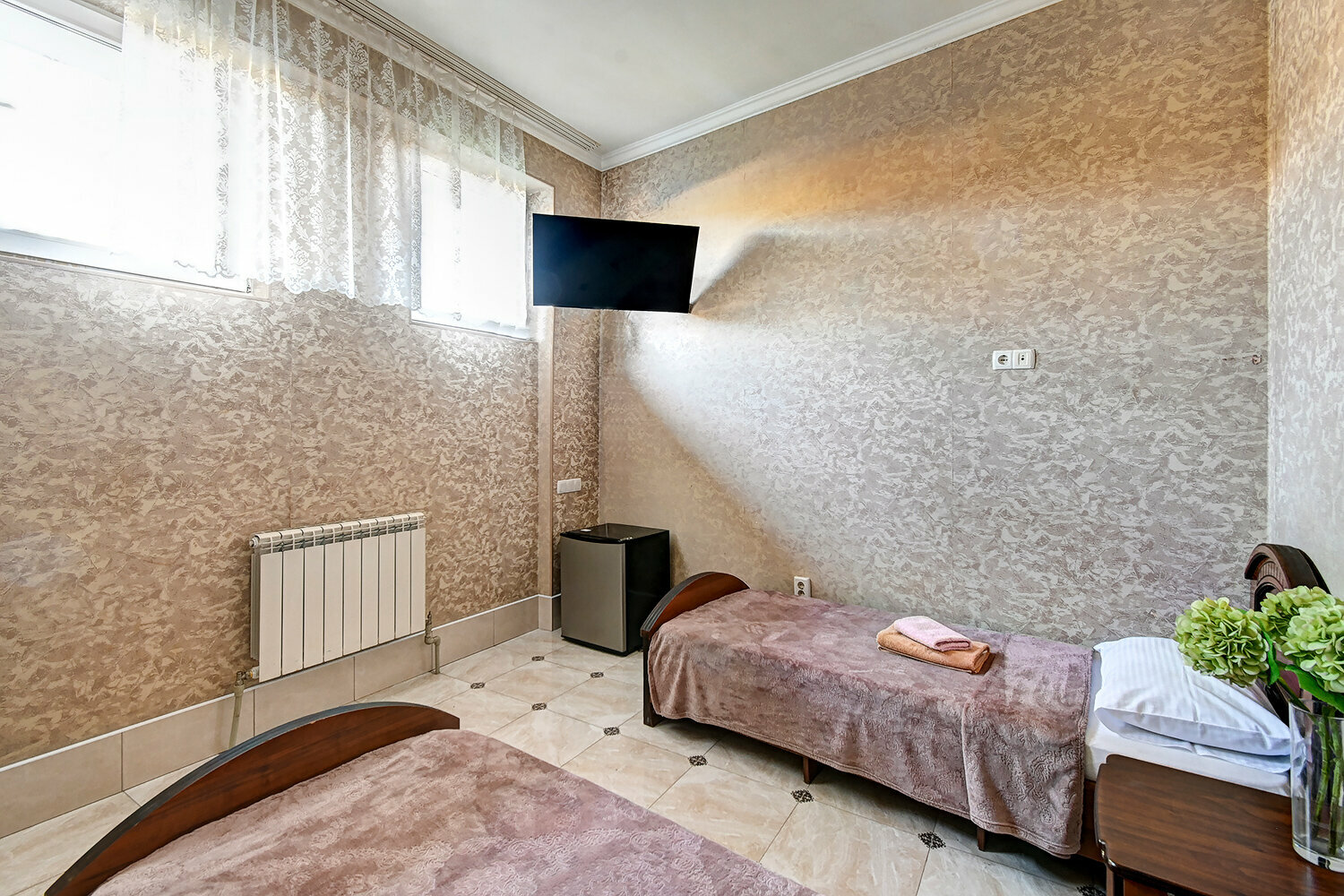 Двухместный номер эконом-класса с 2 отдельными кроватями