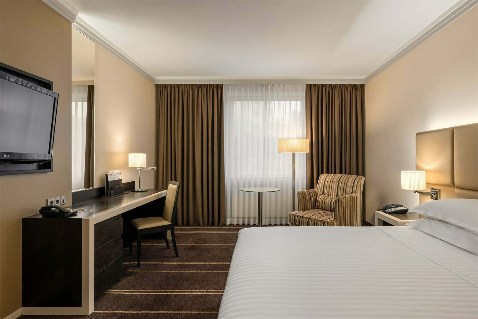 Делюкс с одной большой кроватью