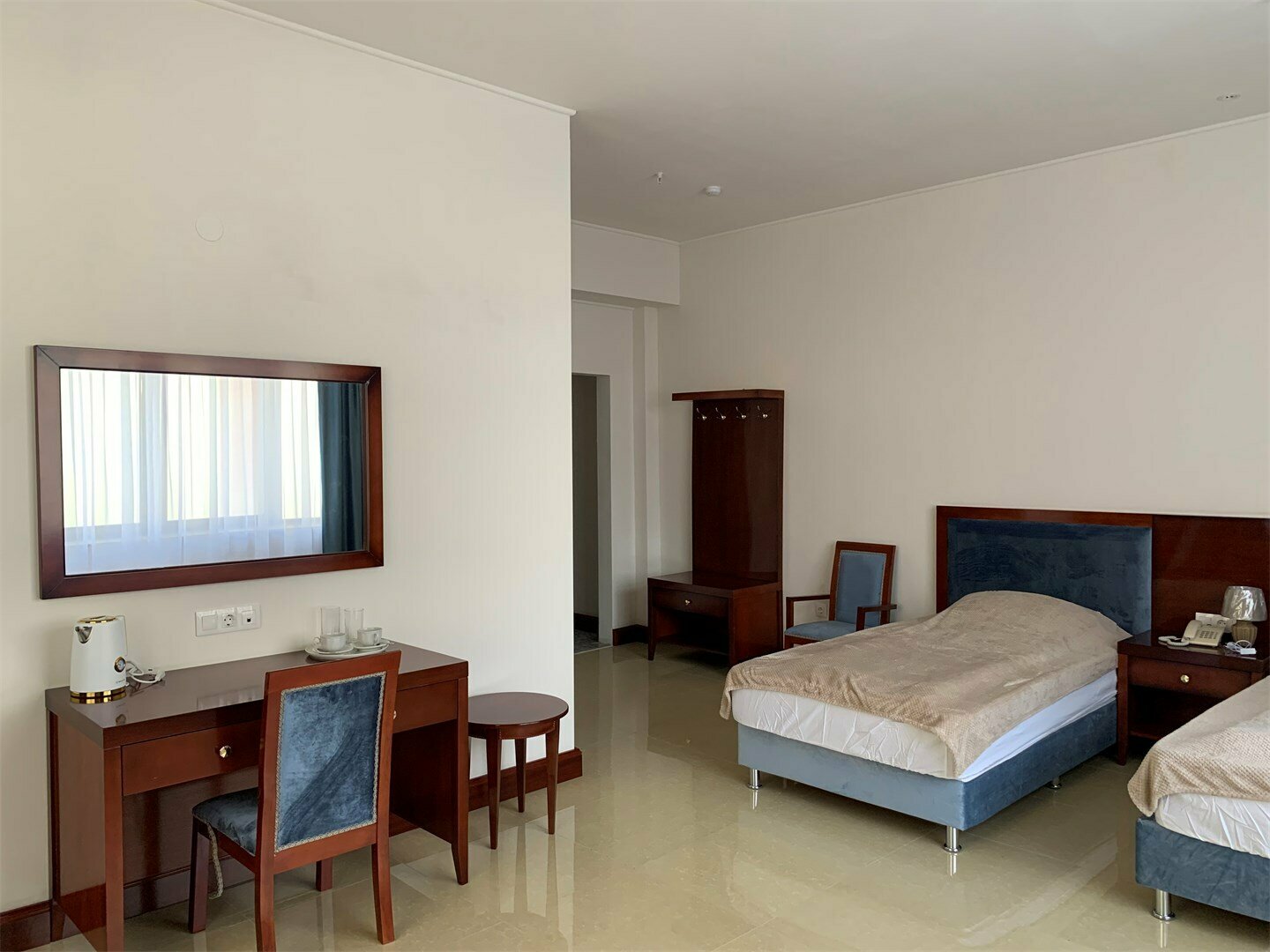 Двухместный номер эконом-класса с 2 отдельными кроватями