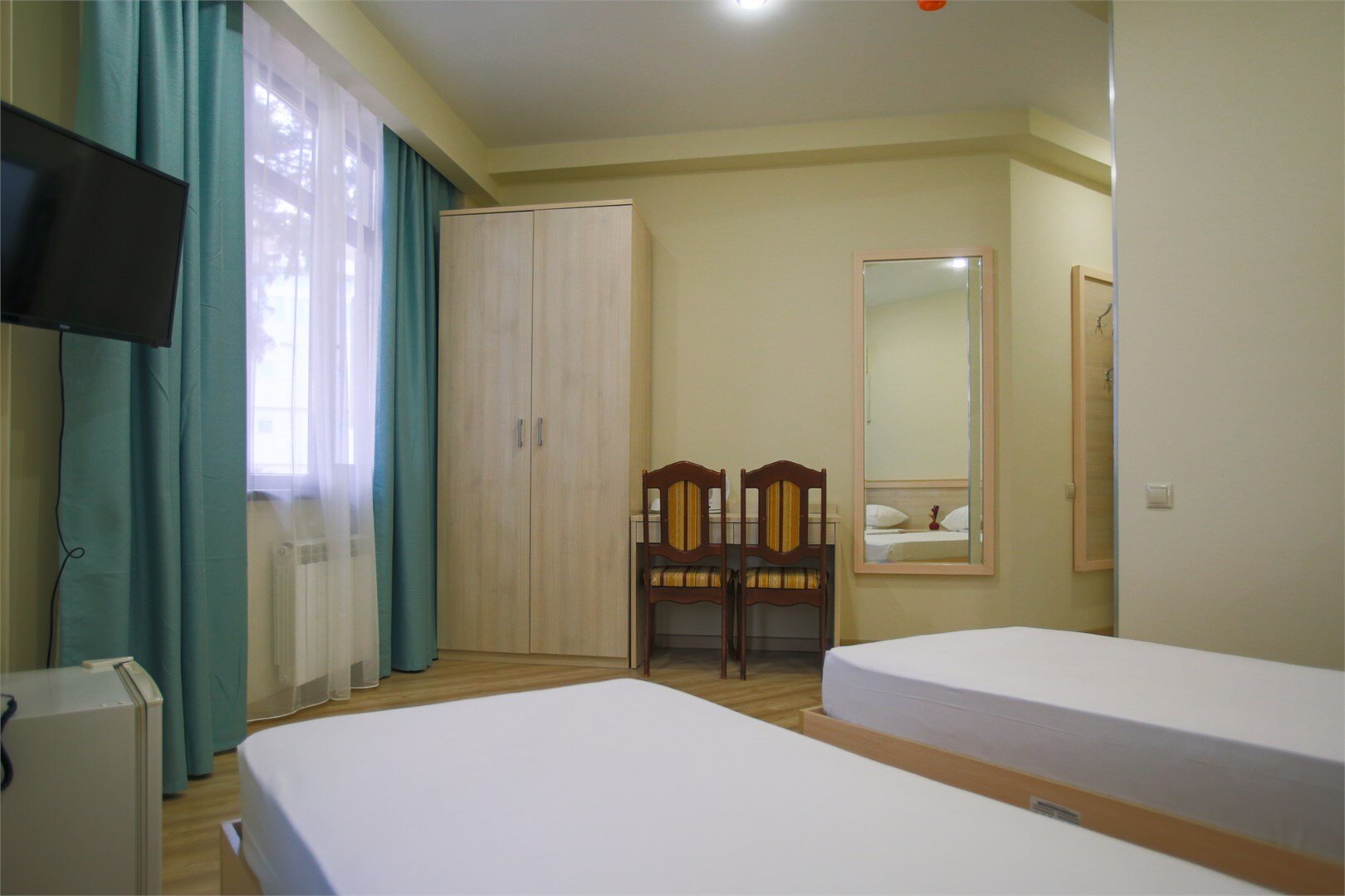 Улучшенный двухместный номер с 2 отдельными кроватями