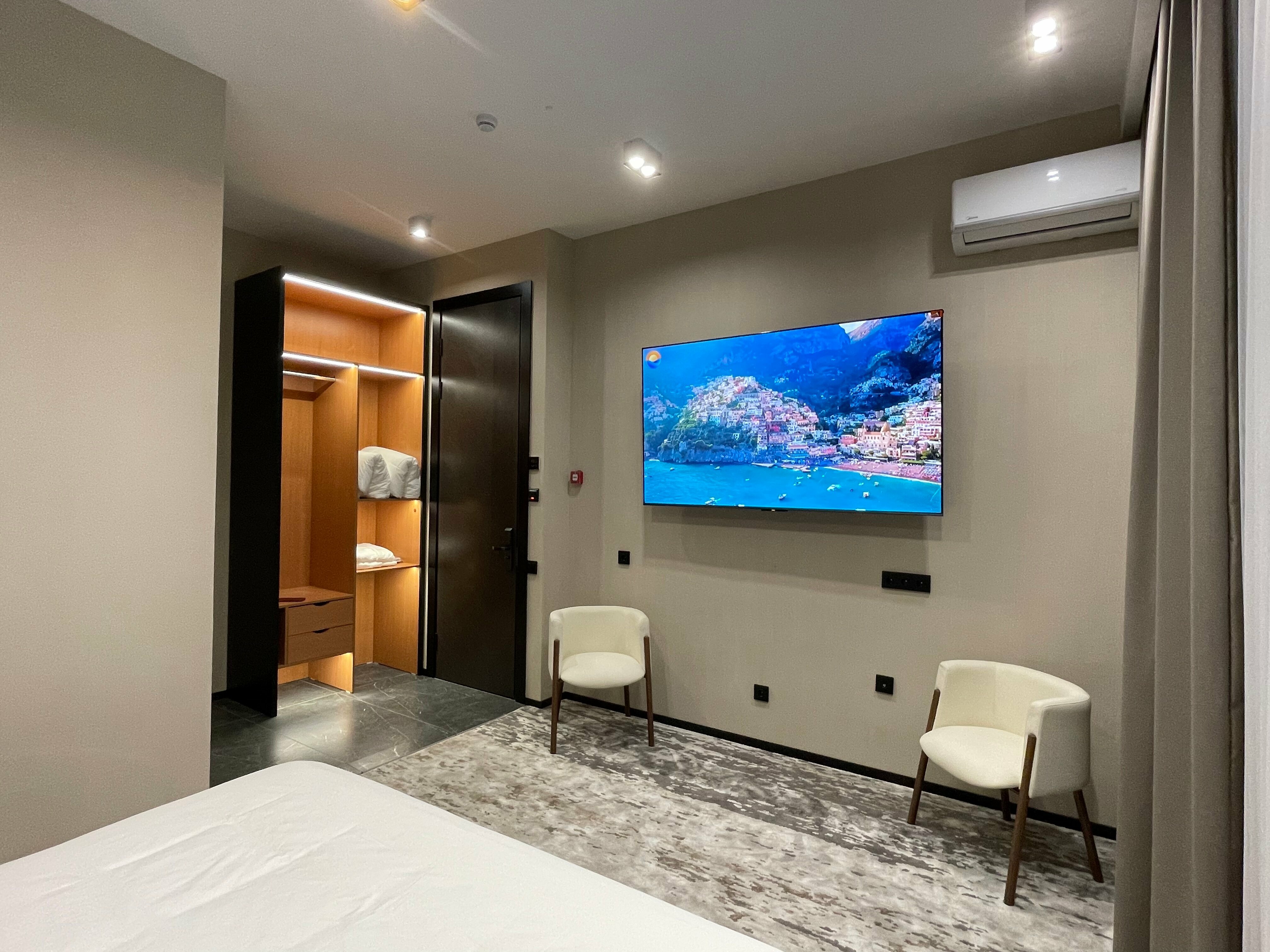 Улучшенный двухместный номер Делюкс с 1 кроватью или 2 отдельными кроватями